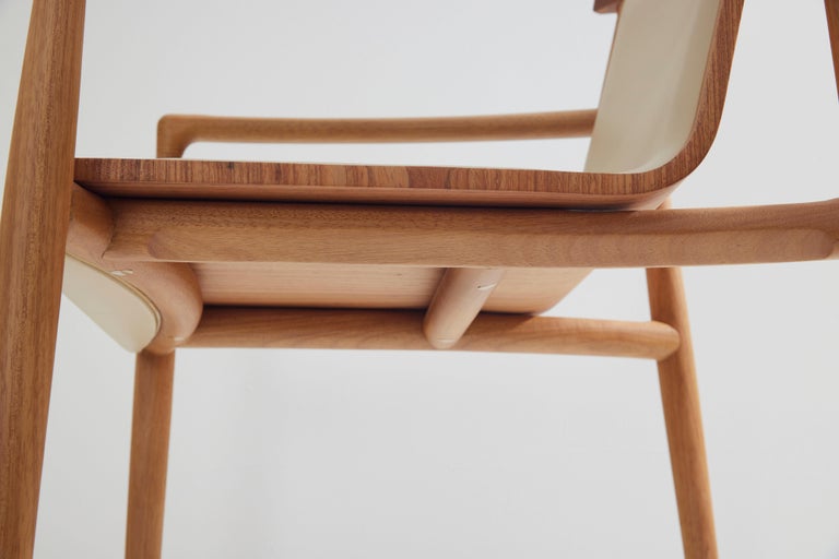 https://a.1stdibscdn.com/contemporary-chair-in-solid-wood-upholstered-in-leather-or-textiles-with-arms-for-sale-picture-7/f_35593/f_245291721626356739575/2021_07_01_DanielSimonini_146_master.jpg?width=768