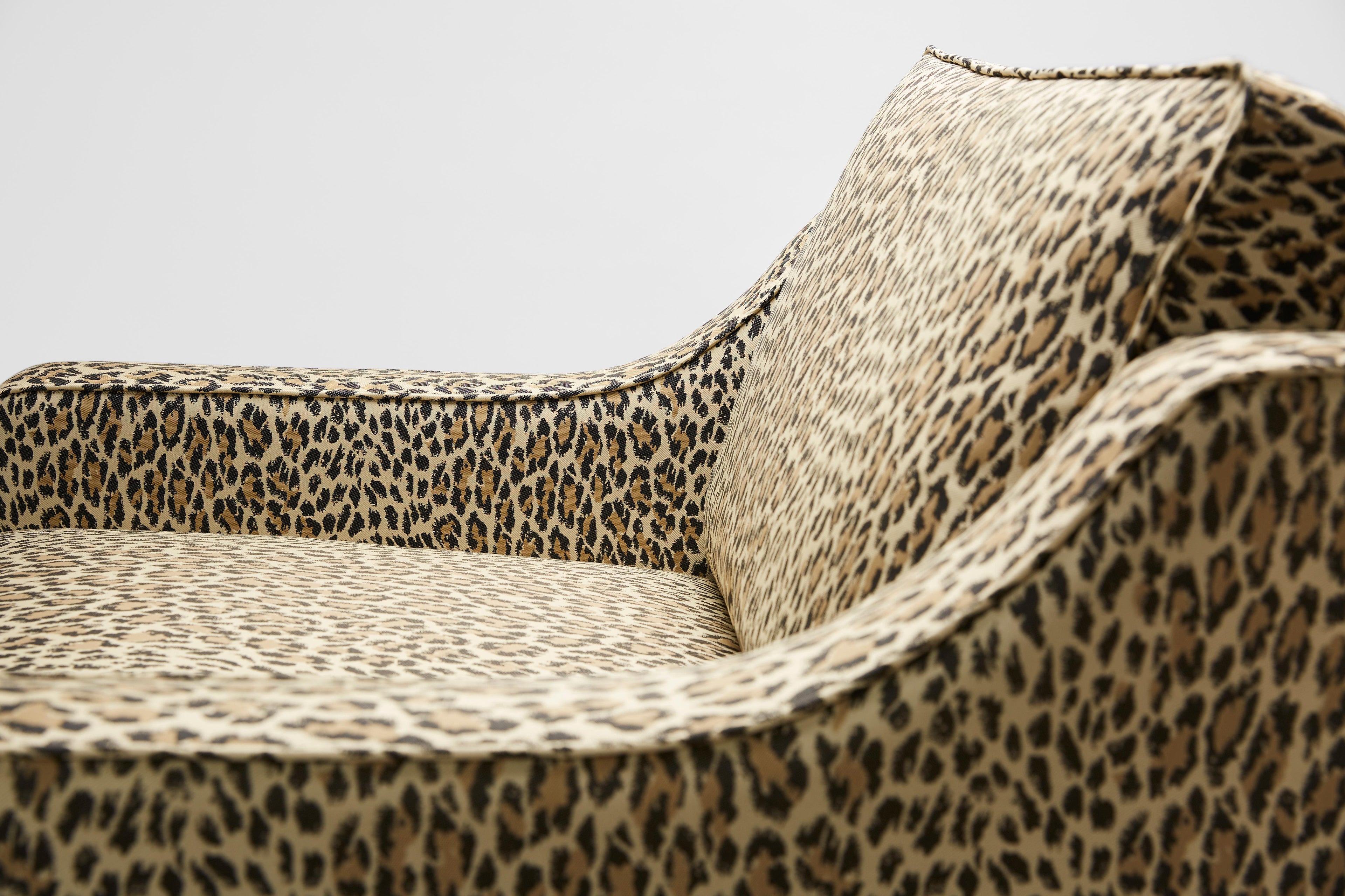 https://a.1stdibscdn.com/contemporary-reposer-arm-chair-in-house-of-hackney-jacquard-and-walnut-legs-for-sale-picture-2/f_27813/f_437094221739984998358/2021_11_16_StuartScott_reposer_wildcard10500_FIN_master.jpg