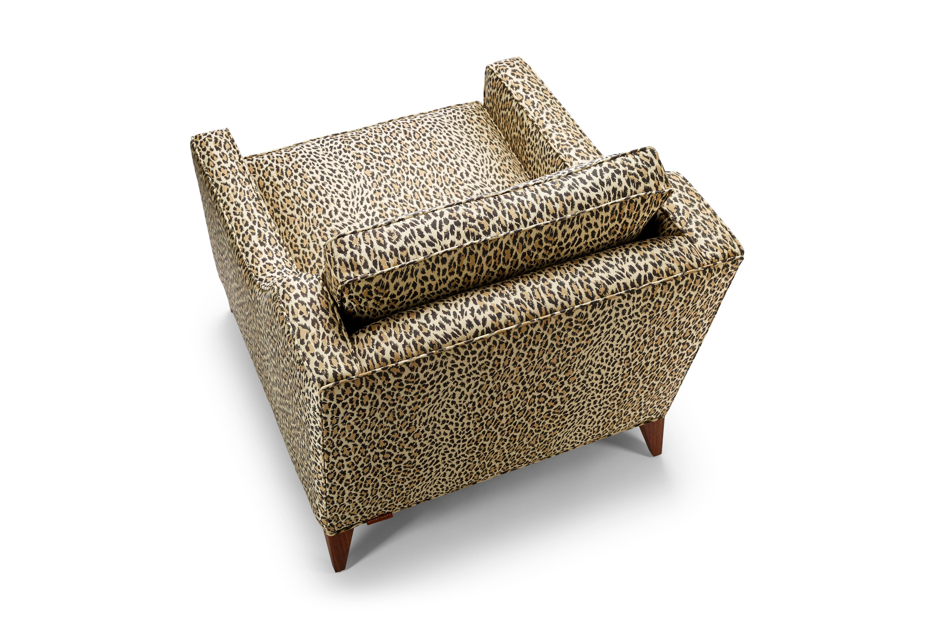 https://a.1stdibscdn.com/contemporary-reposer-arm-chair-in-house-of-hackney-jacquard-and-walnut-legs-for-sale-picture-3/f_27813/f_437094221739984989895/2021_11_16_StuartScott_reposer_wildcard10525_FIN_master.jpg