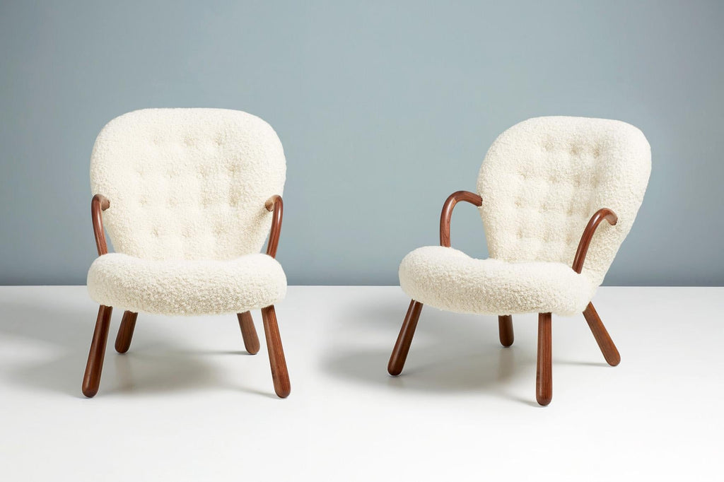 https://a.1stdibscdn.com/pair-of-arnold-madsen-boucle-clam-chairs-for-sale-picture-5/f_13332/f_291079421655219195080/20220504_DagmarFurniture_Batch_069_ArnoldMadsenDagmar_ClamChair_REPRO_Opio_WhiteWalnut_10_13PAIR_master.jpg