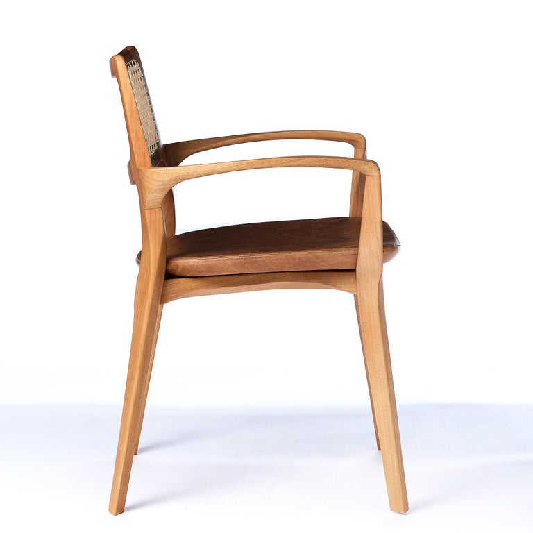 https://a.1stdibscdn.com/post-modern-style-aurora-chair-in-sculpted-solid-wood-with-cane-back-and-leather-for-sale-picture-3/f_35593/f_299051321659978678088/2022_05_27_Emporio_Cadeiras_19803_master.jpg?width=768