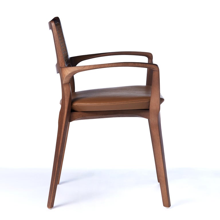 https://a.1stdibscdn.com/post-modern-style-aurora-chair-in-sculpted-walnut-finish-with-cane-and-leather-for-sale-picture-3/f_35593/f_299044221659978117449/2022_05_27_Emporio_Cadeiras_19810_master.jpg?width=768