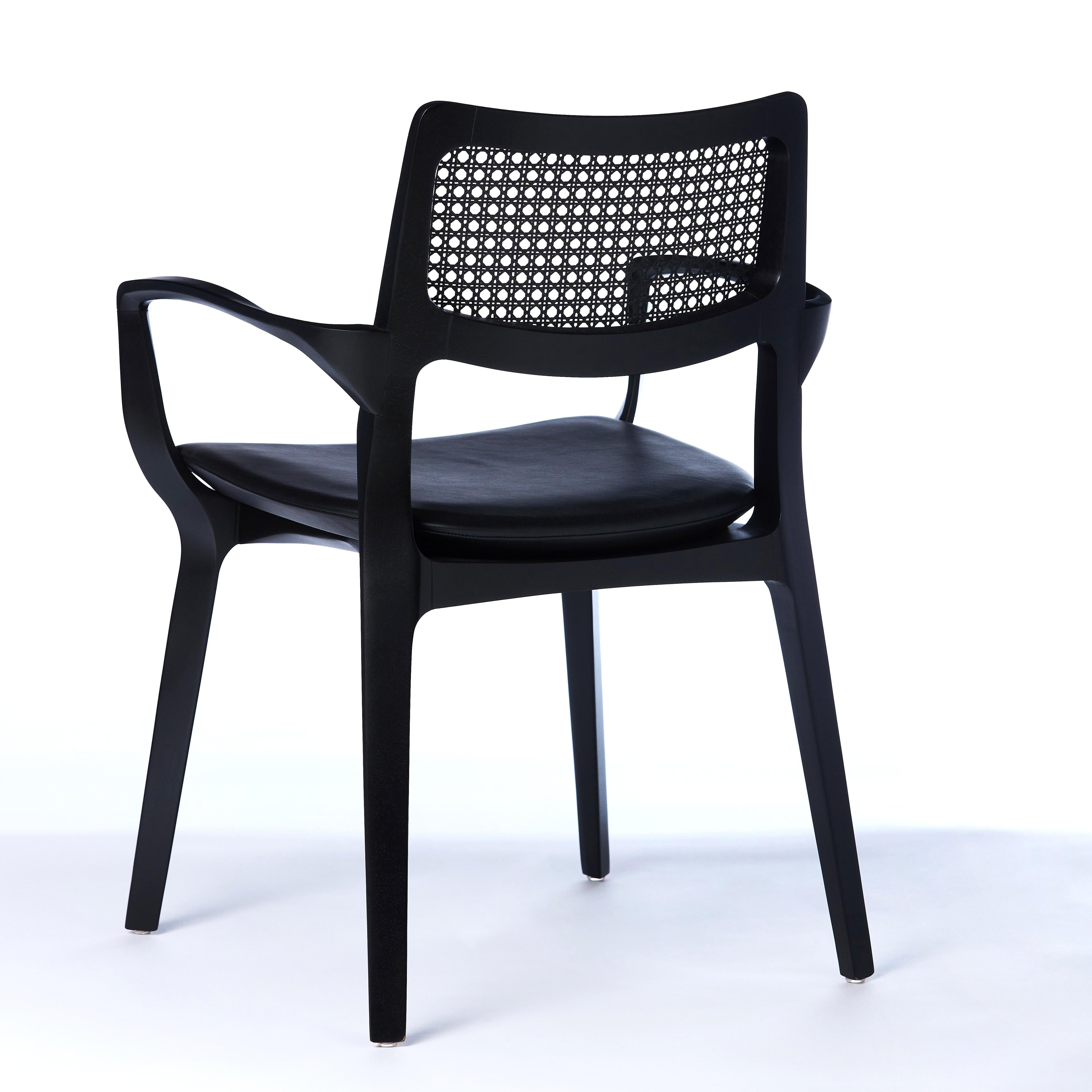 https://a.1stdibscdn.com/post-modern-style-aurora-chair-in-black-ebonized-with-cane-back-and-leather-for-sale-picture-4/f_35593/f_299053921659979783160/2022_05_27_Emporio_Cadeiras_19817_master.jpg