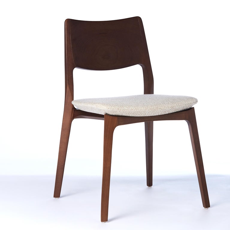 https://a.1stdibscdn.com/modern-style-aurora-chair-sculpted-in-walnut-finish-no-arms-leather-seating-for-sale-picture-8/f_35593/f_390184821711479982526/2022_05_27_Emporio_Cadeiras_19849_master.jpg?width=768