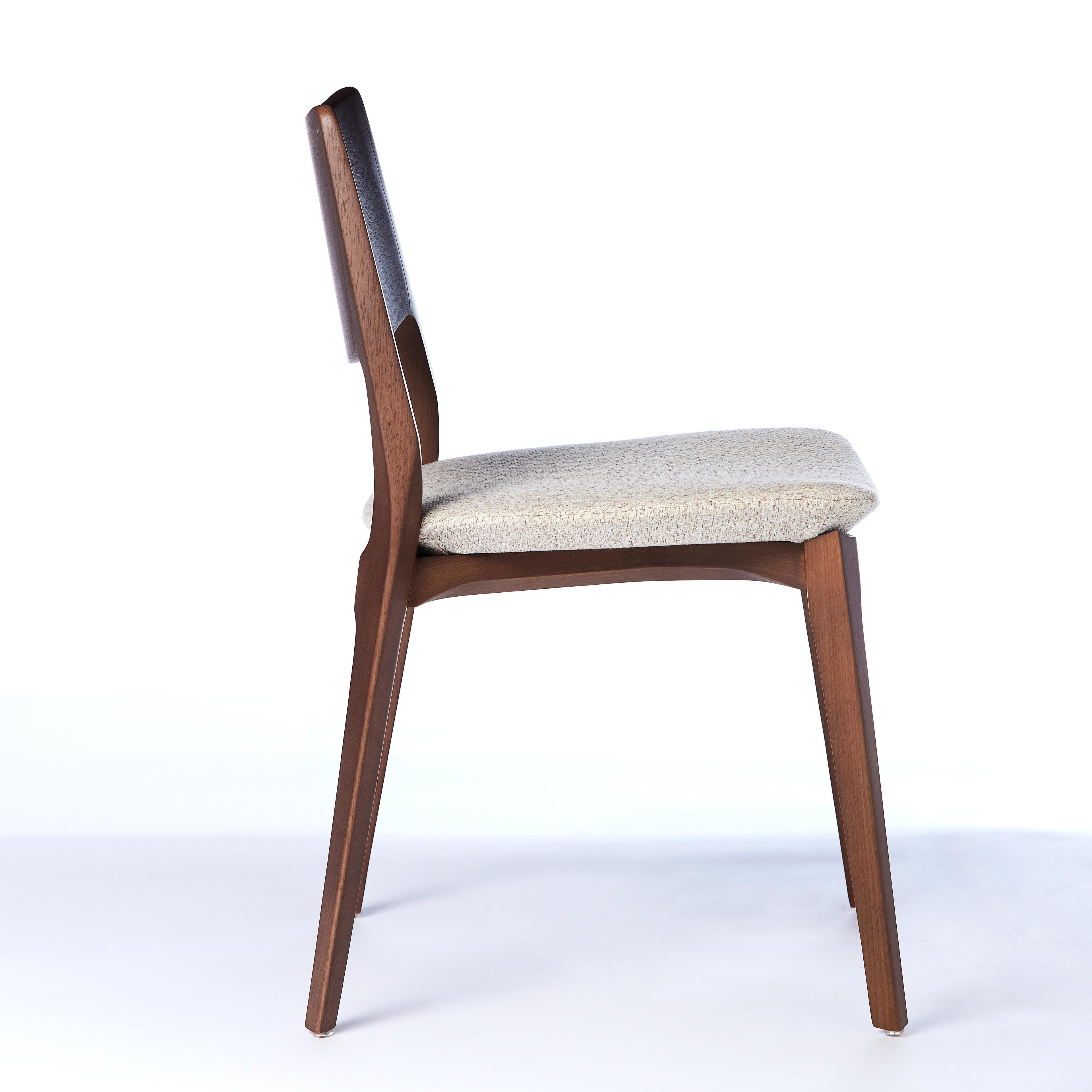 https://a.1stdibscdn.com/modern-style-aurora-chair-sculpted-in-walnut-finish-no-arms-upholstered-seat-for-sale-picture-3/f_35593/f_299068321659985595969/2022_05_27_Emporio_Cadeiras_19850_master.jpg