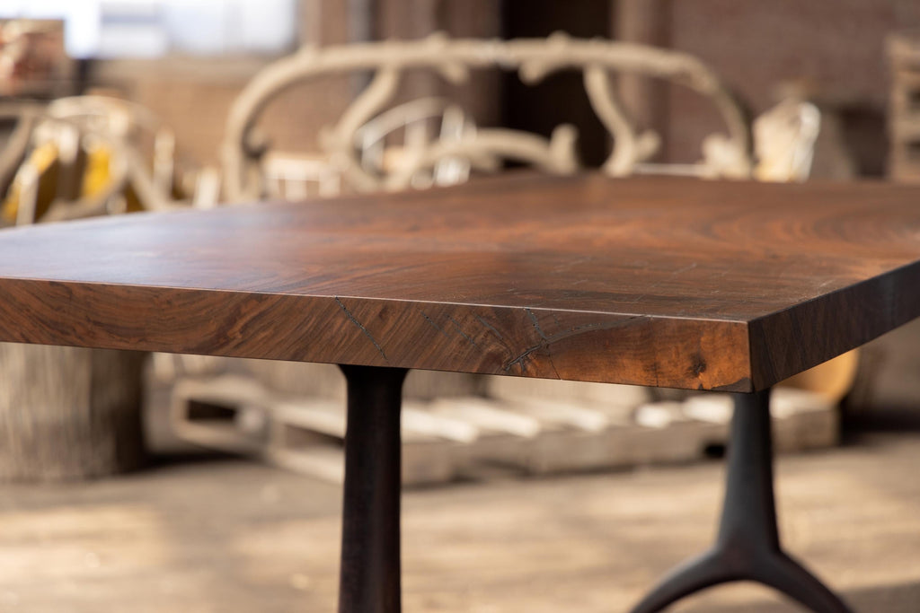https://a.1stdibscdn.com/live-edge-walnut-table-hand-cast-black-steel-pedestal-base-for-sale-picture-5/f_43982/f_271682621643666358910/2022_05_R5_0219_3000px_master.jpg