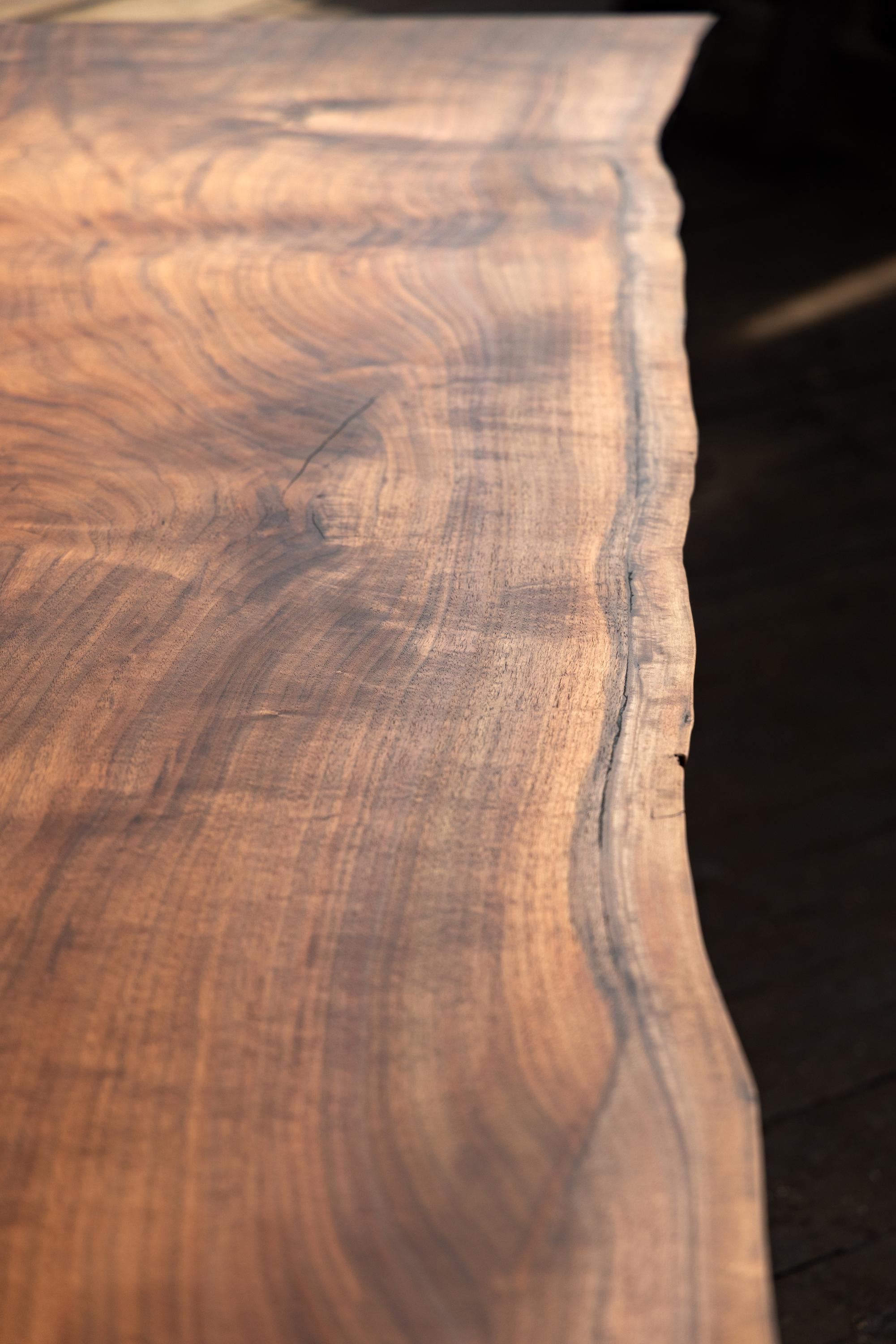 https://a.1stdibscdn.com/live-edge-walnut-table-hand-cast-black-steel-pedestal-base-for-sale-picture-7/f_43982/f_271682621643666361463/2022_05_R5_0240_3000px_master.jpg
