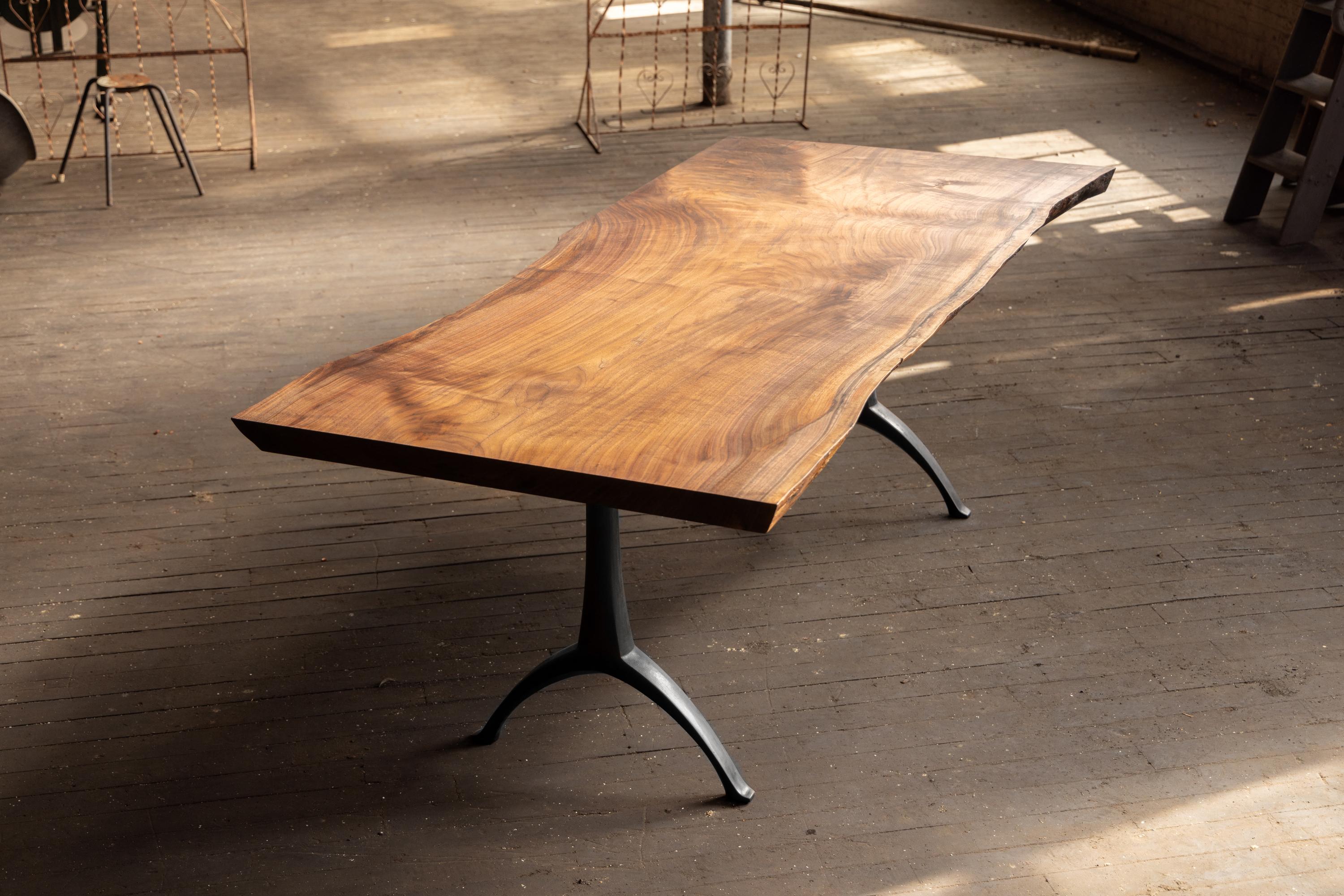https://a.1stdibscdn.com/live-edge-walnut-table-hand-cast-black-steel-pedestal-base-for-sale-picture-8/f_43982/f_271682621643666366519/2022_05_R5_0243_3000px_master.jpg