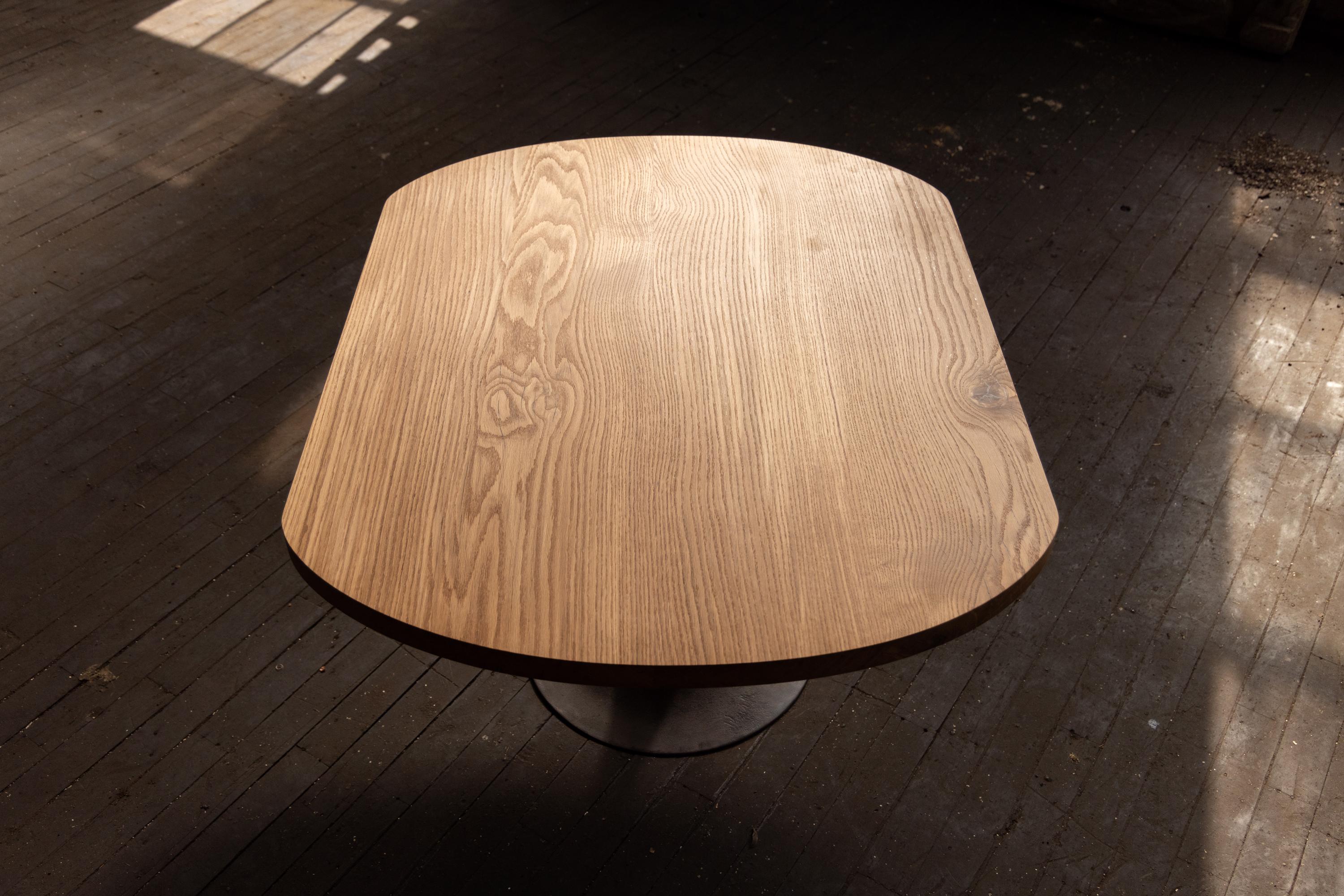 https://a.1stdibscdn.com/round-racetrack-pedestal-dining-table-white-oak-on-cast-iron-amicalola-base-for-sale-picture-7/f_43982/f_271684621643666958953/2022_05_R5_0276_3000px_master.jpg