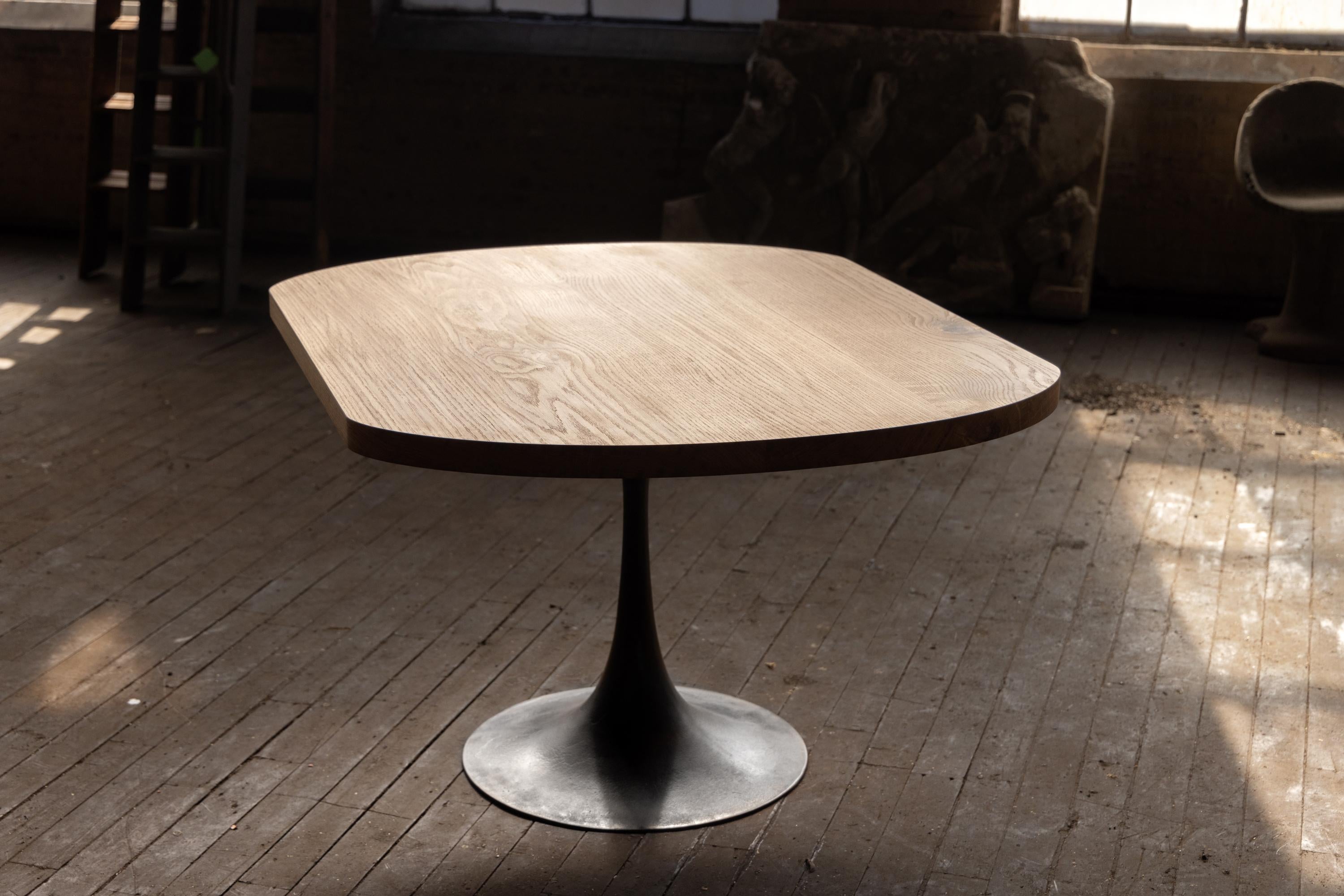 https://a.1stdibscdn.com/round-racetrack-pedestal-dining-table-white-oak-on-cast-iron-amicalola-base-for-sale-picture-8/f_43982/f_271684621643666956523/2022_05_R5_0282_3000px_master.jpg