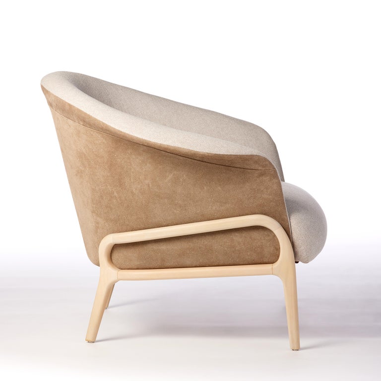 https://a.1stdibscdn.com/modern-organic-style-collana-armchair-in-solid-wood-leather-flexible-seating-for-sale-picture-4/f_35593/f_299072121659987265366/2022_06_09_Daniel_Simonini19984_master.jpg?width=768