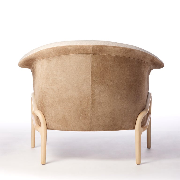 https://a.1stdibscdn.com/modern-organic-style-collana-armchair-in-solid-wood-leather-flexible-seating-for-sale-picture-5/f_35593/f_299072121659987265556/2022_06_09_Daniel_Simonini19987_master.jpg?width=768