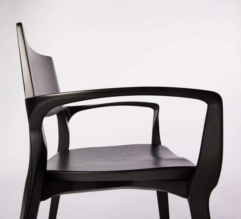 https://a.1stdibscdn.com/post-modern-style-aurora-chair-in-sculpted-black-ebonized-solid-wood-for-sale-picture-7/f_35593/f_299067221659985322188/2022_06_09_Daniel_Simonini20167_master.jpg?width=768
