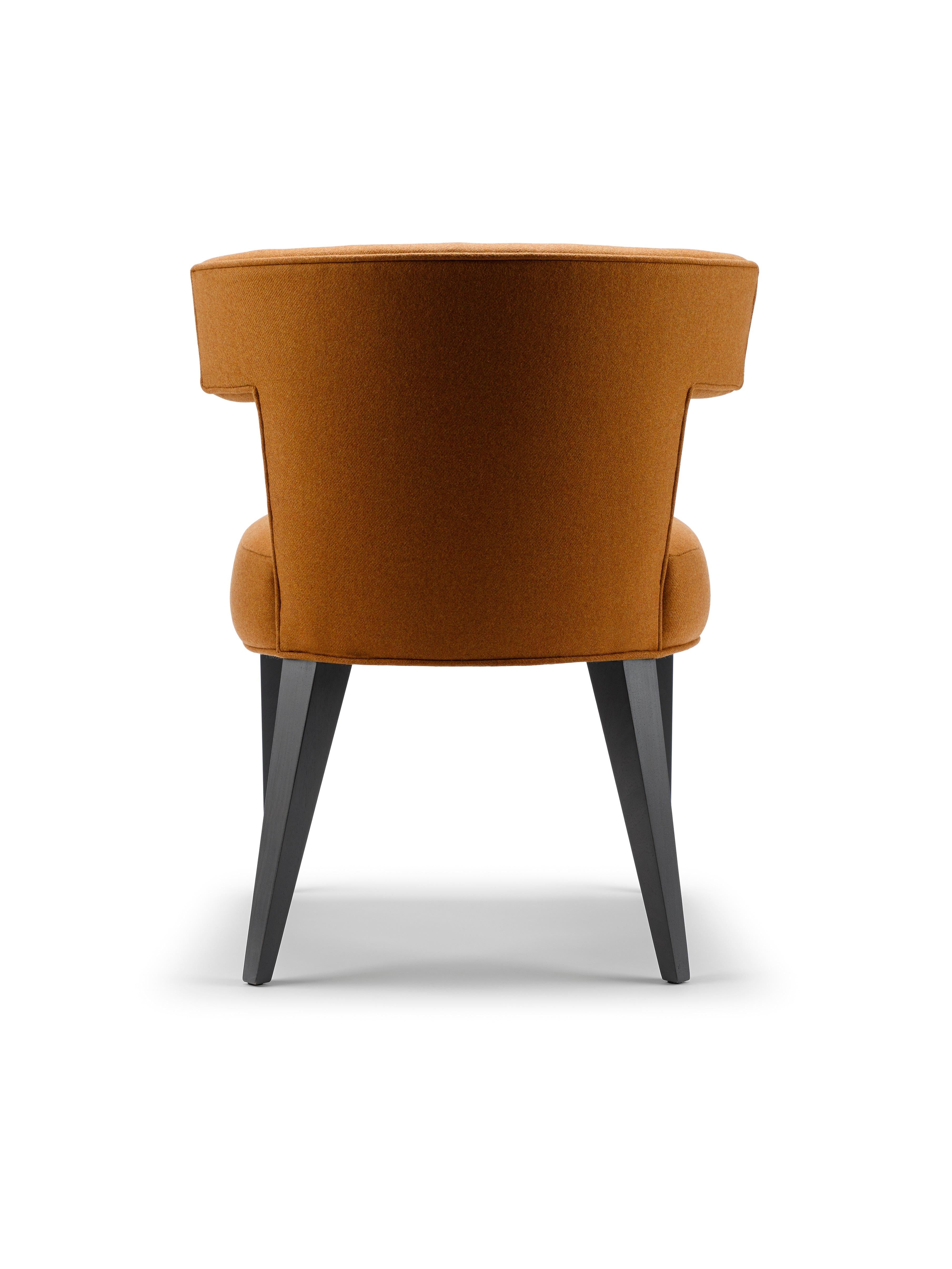 https://a.1stdibscdn.com/contemporary-isabella-dining-chair-in-melton-wool-with-solid-walnut-legs-for-sale-picture-4/f_27813/f_235746021652429522954/2022_1_10_IsabellaDiningChair15818_FIN_02_master.jpg