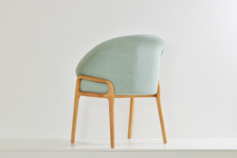 https://a.1stdibscdn.com/minimalist-organic-chair-in-black-solid-wood-cian-textiles-seating-for-sale-picture-4/f_35593/f_389381021710966371894/2023_07_05_Simonini8745_master.jpg?width=768