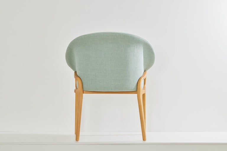 https://a.1stdibscdn.com/minimalist-organic-chair-in-black-solid-wood-cian-textiles-seating-for-sale-picture-5/f_35593/f_389381021710966372397/2023_07_05_Simonini8746_master.jpg?width=768