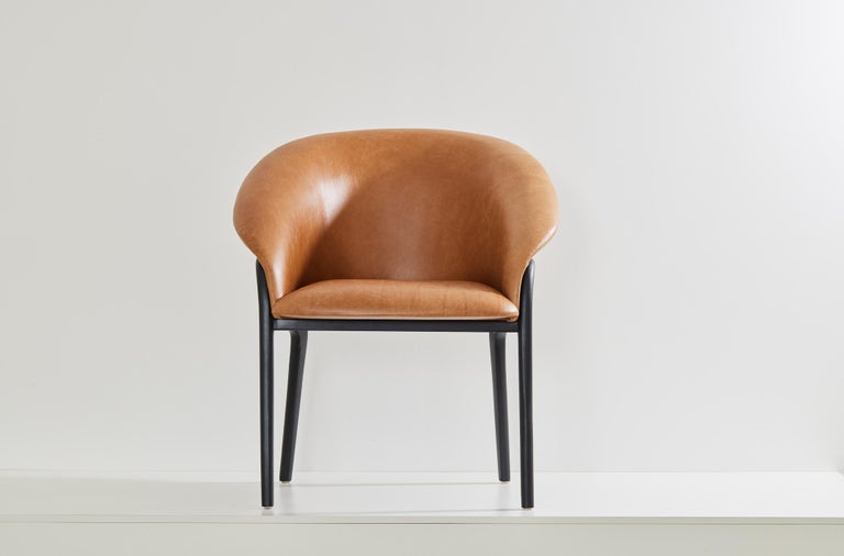 https://a.1stdibscdn.com/minimalist-organic-chair-in-black-solid-wood-camel-leather-seating-tone-for-sale-picture-2/f_35593/f_389190621710882742051/2023_07_05_Simonini8820_master.jpg?width=768