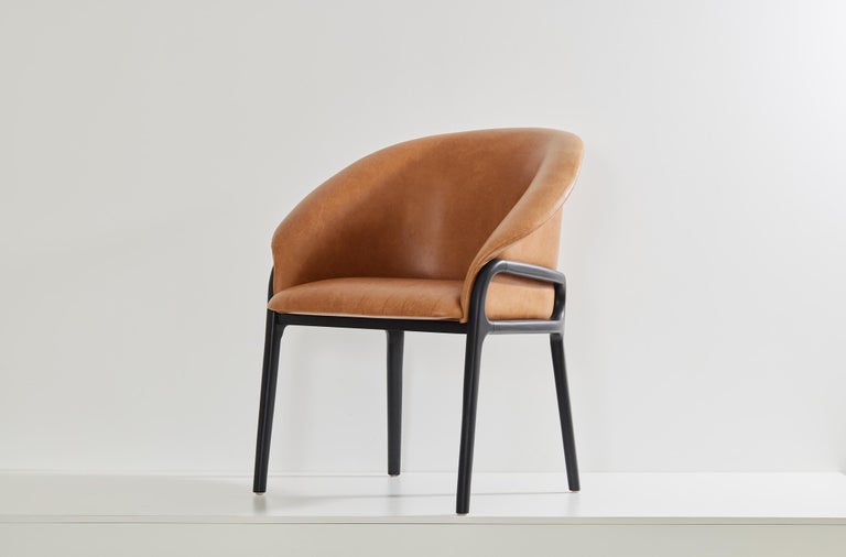 https://a.1stdibscdn.com/minimalist-organic-chair-in-black-solid-wood-cian-textiles-seating-for-sale-picture-7/f_35593/f_389381021710966373892/2023_07_05_Simonini8821_master.jpg?width=768