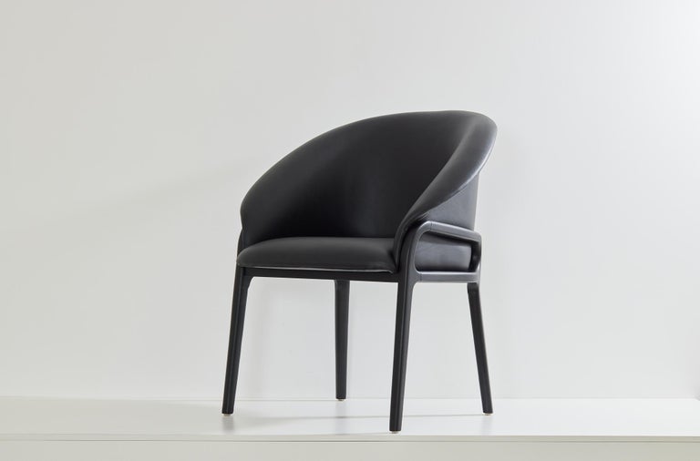 https://a.1stdibscdn.com/minimalist-organic-chair-in-black-solid-wood-cian-textiles-seating-for-sale-picture-8/f_35593/f_389381021710966374812/2023_07_05_Simonini8851_master.jpg?width=768