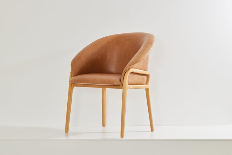 https://a.1stdibscdn.com/minimalist-organic-chair-in-black-solid-wood-cian-textiles-seating-for-sale-picture-9/f_35593/f_389381021710966375931/2023_07_05_Simonini8909_master.jpg?width=768