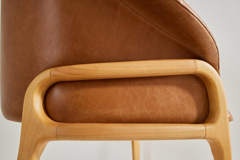 https://a.1stdibscdn.com/minimalist-organic-chair-in-solid-wood-camel-leather-seating-tone-for-sale-picture-7/f_35593/f_389179221710880960270/2023_07_05_Simonini8918_master.jpg?width=768