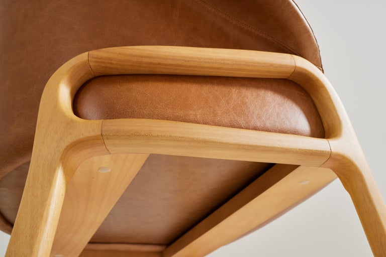 https://a.1stdibscdn.com/minimalist-organic-chair-in-solid-wood-camel-leather-seating-tone-for-sale-picture-6/f_35593/f_389179221710880966980/2023_07_05_Simonini8919_master.jpg?width=768
