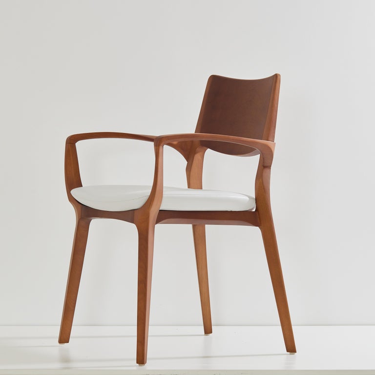 https://a.1stdibscdn.com/post-modern-style-aurora-chair-in-honey-solid-wood-vegan-leather-seating-for-sale-picture-3/f_35593/f_358034721692649105565/2023_07_05_Simonini8963_master.jpg?width=768
