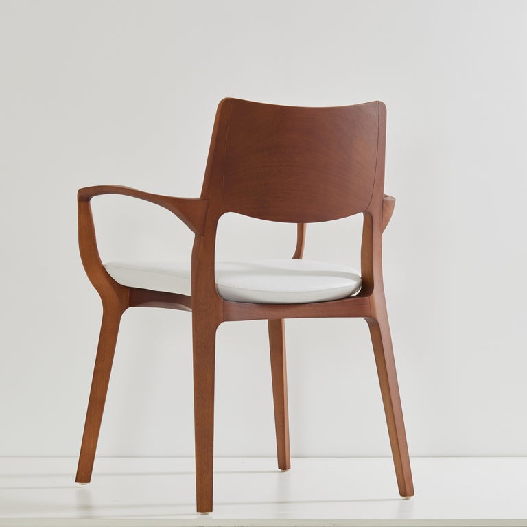 https://a.1stdibscdn.com/post-modern-style-aurora-chair-in-honey-solid-wood-vegan-leather-seating-for-sale-picture-5/f_35593/f_358034721692649107046/2023_07_05_Simonini8966_master.jpg?width=768