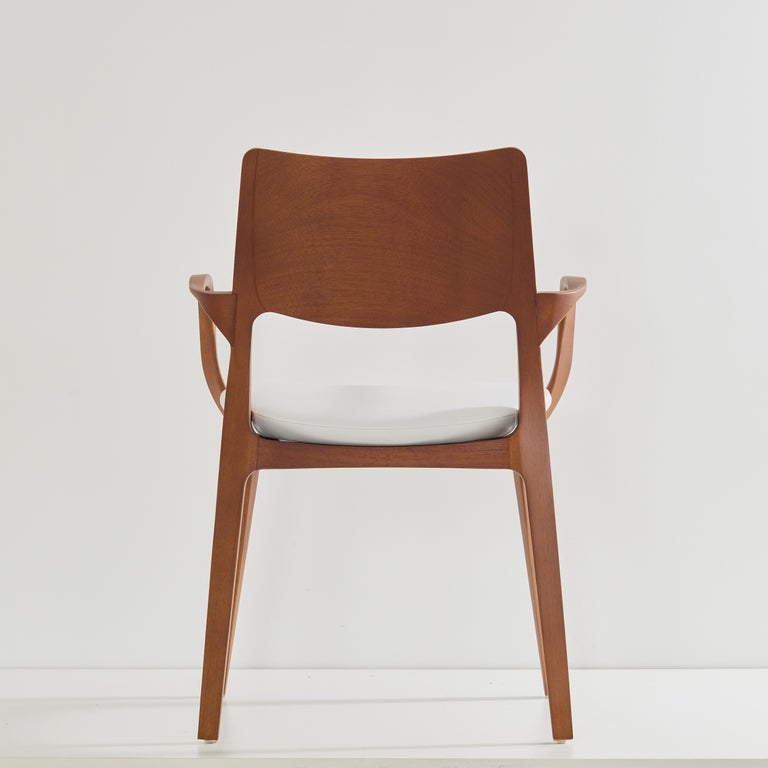 https://a.1stdibscdn.com/post-modern-style-aurora-chair-in-honey-solid-wood-vegan-leather-seating-for-sale-picture-6/f_35593/f_358034721692649107648/2023_07_05_Simonini8967_master.jpg?width=768