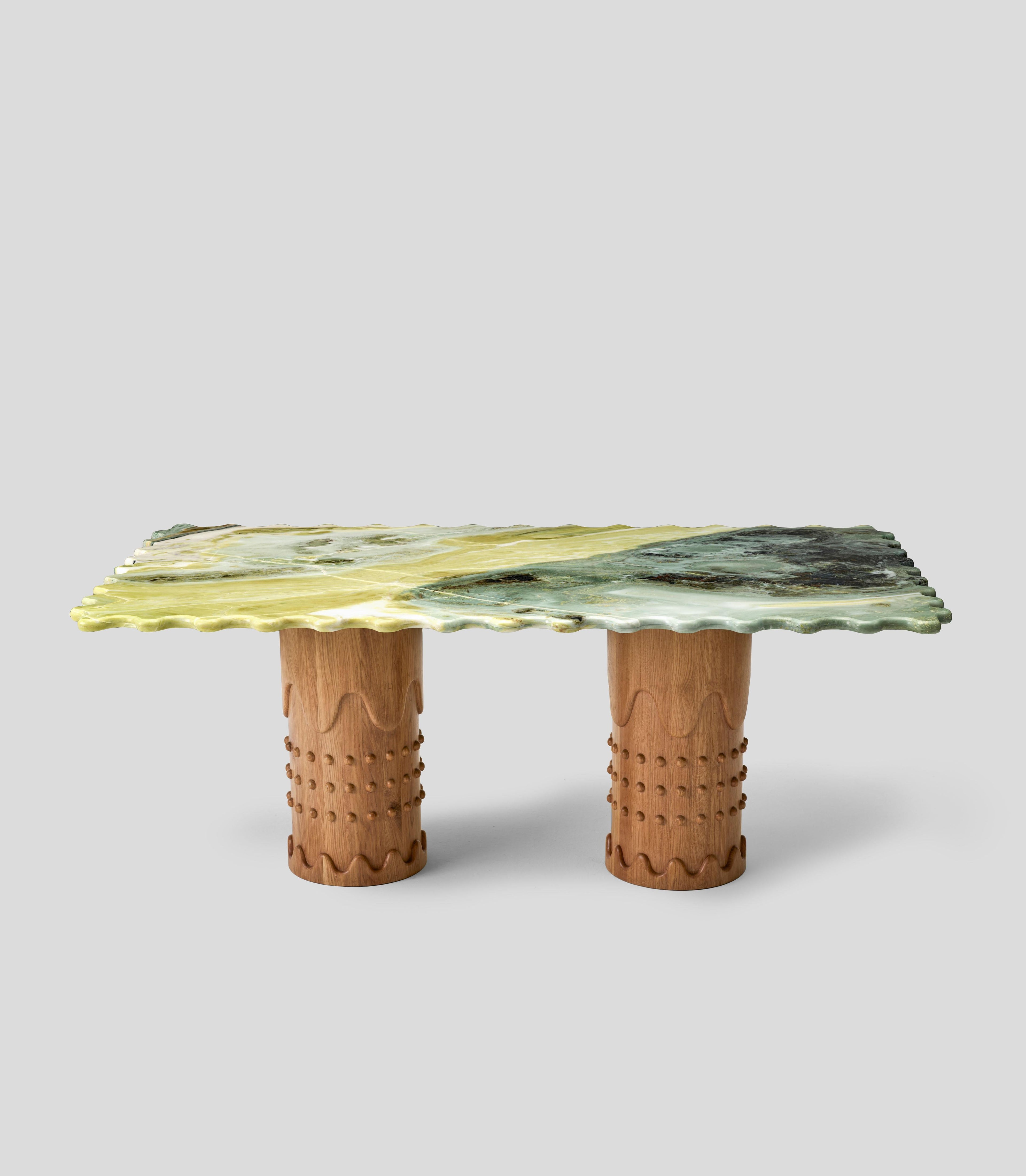 https://a.1stdibscdn.com/metlife-green-marble-dining-table-with-handcarved-oak-legs-for-sale-picture-5/f_36601/f_419888421729603176777/20240627_MK34412__master.jpg