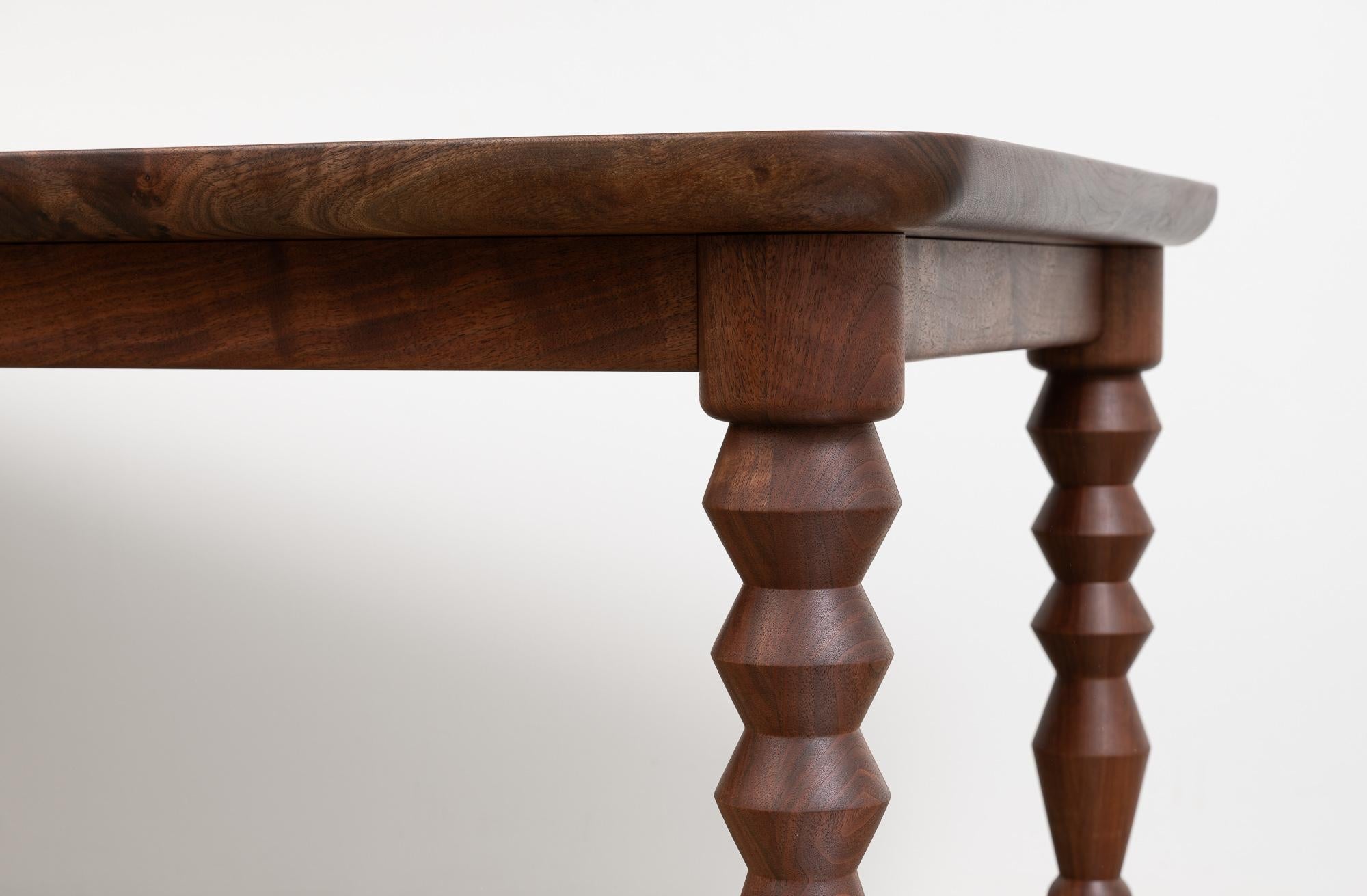 https://a.1stdibscdn.com/bead-legs-lite-dining-table-modern-handcrafted-dining-table-in-black-walnut-for-sale-picture-7/f_57552/f_431116721736549482046/2024_12_11_Spacecraft_017_web_master.jpg