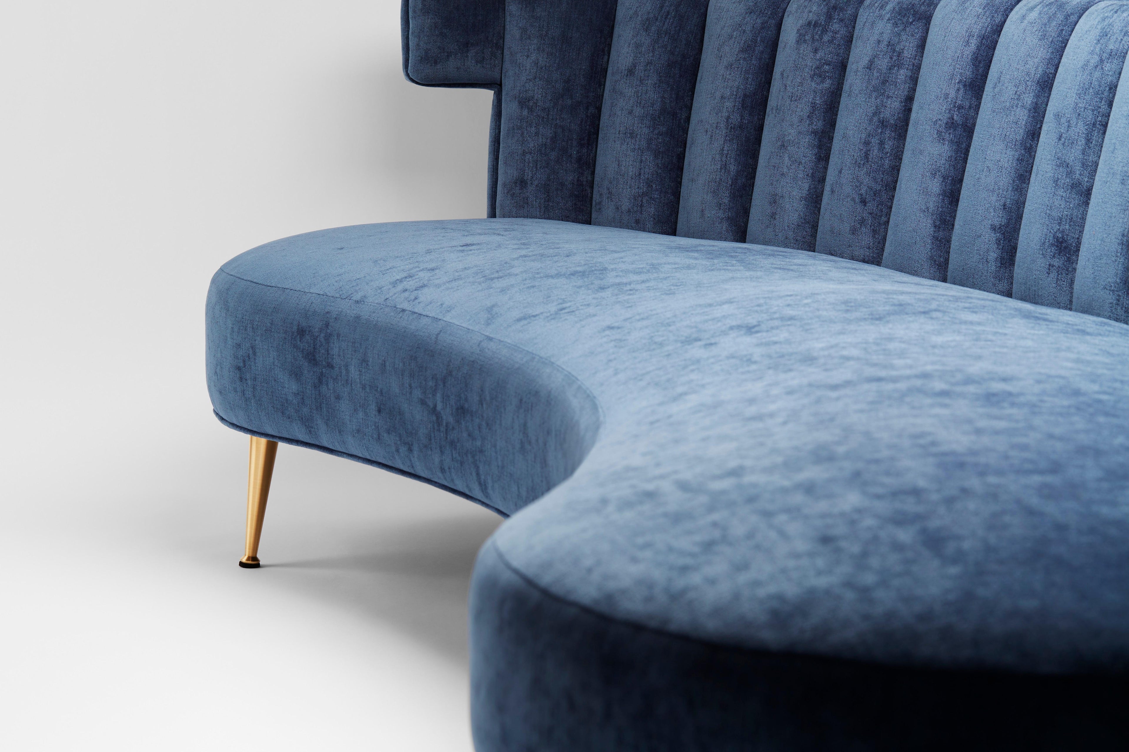 https://a.1stdibscdn.com/isabella-super-curve-sofa-in-denim-blue-velvet-brass-legs-for-sale-picture-6/f_27813/f_477361921764269136007/2025_10_11_Supercurve_SScott1383_master.jpg