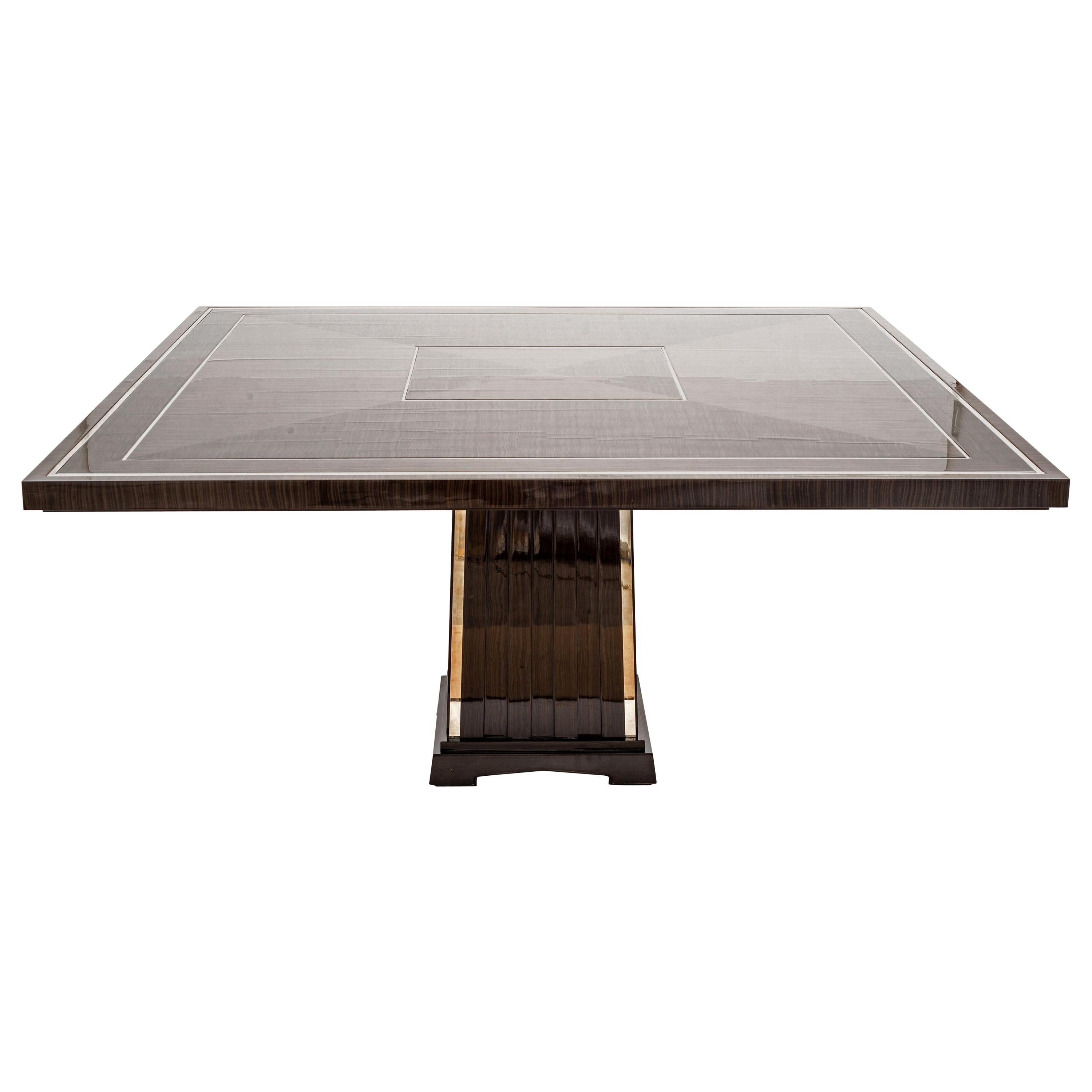 https://a.1stdibscdn.com/art-deco-style-important-dining-room-table-veneer-wood-top-and-chrome-inserts-for-sale/1121189/f_207354321601119569728/20735432_master.jpg