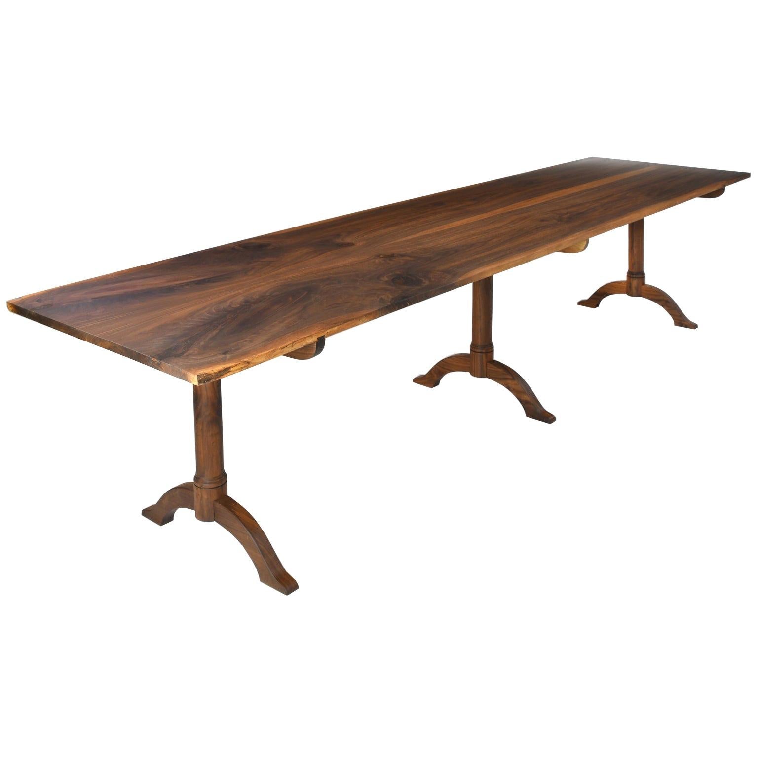 https://a.1stdibscdn.com/bonnin-ashley-custom-made-dining-table-in-black-walnut-w-linseed-oil-finish-for-sale/1121189/f_209940821602927775759/20994082_master.jpg