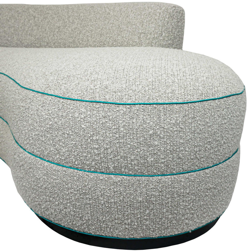 https://a.1stdibscdn.com/boucle-curved-sofa-with-turquoise-accents-for-sale-picture-16/f_21233/1622750916169/20_master.jpg