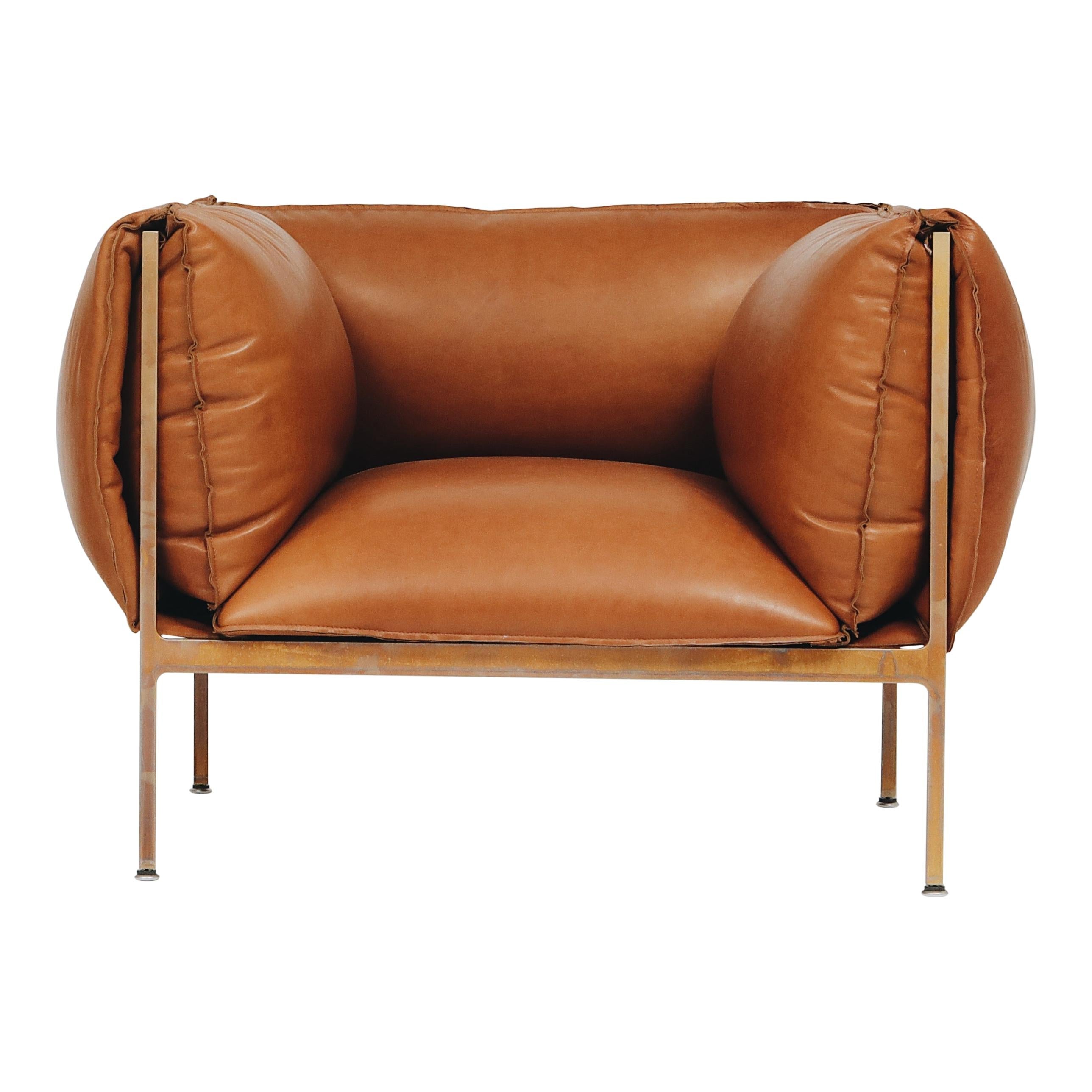https://a.1stdibscdn.com/armchair-in-cognac-leather-and-burnished-brass-plated-laser-cut-steel-frame-for-sale/f_28533/f_465502721757107270238/21198382_master.jpg