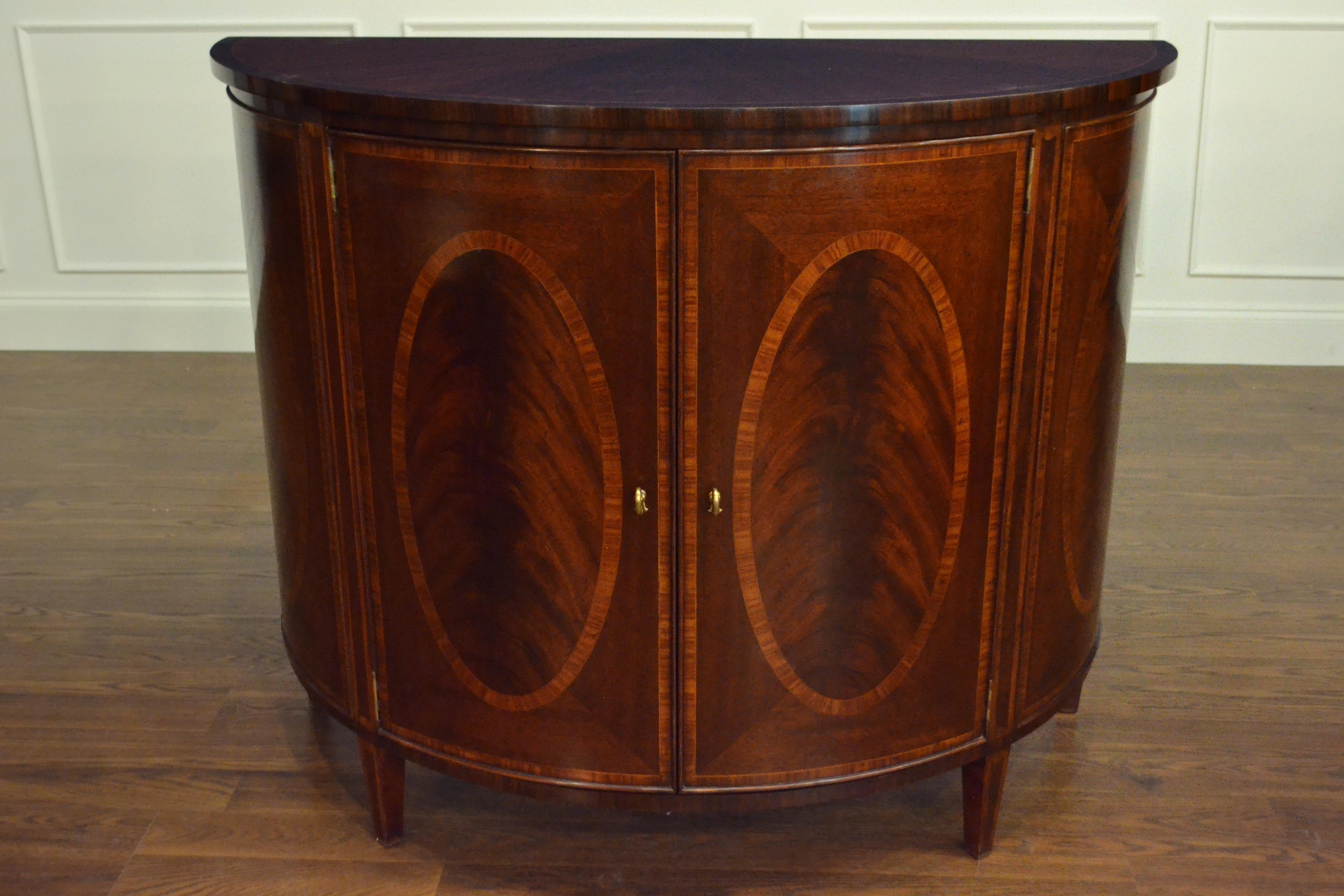 https://a.1stdibscdn.com/hepplewhite-style-mahogany-demilune-cabinet-by-leighton-hall-for-sale-picture-7/f_44162/f_154696221563149634431/214C4F58_3A45_4BAA_AF55_67DB4DC2BE12_master.jpeg