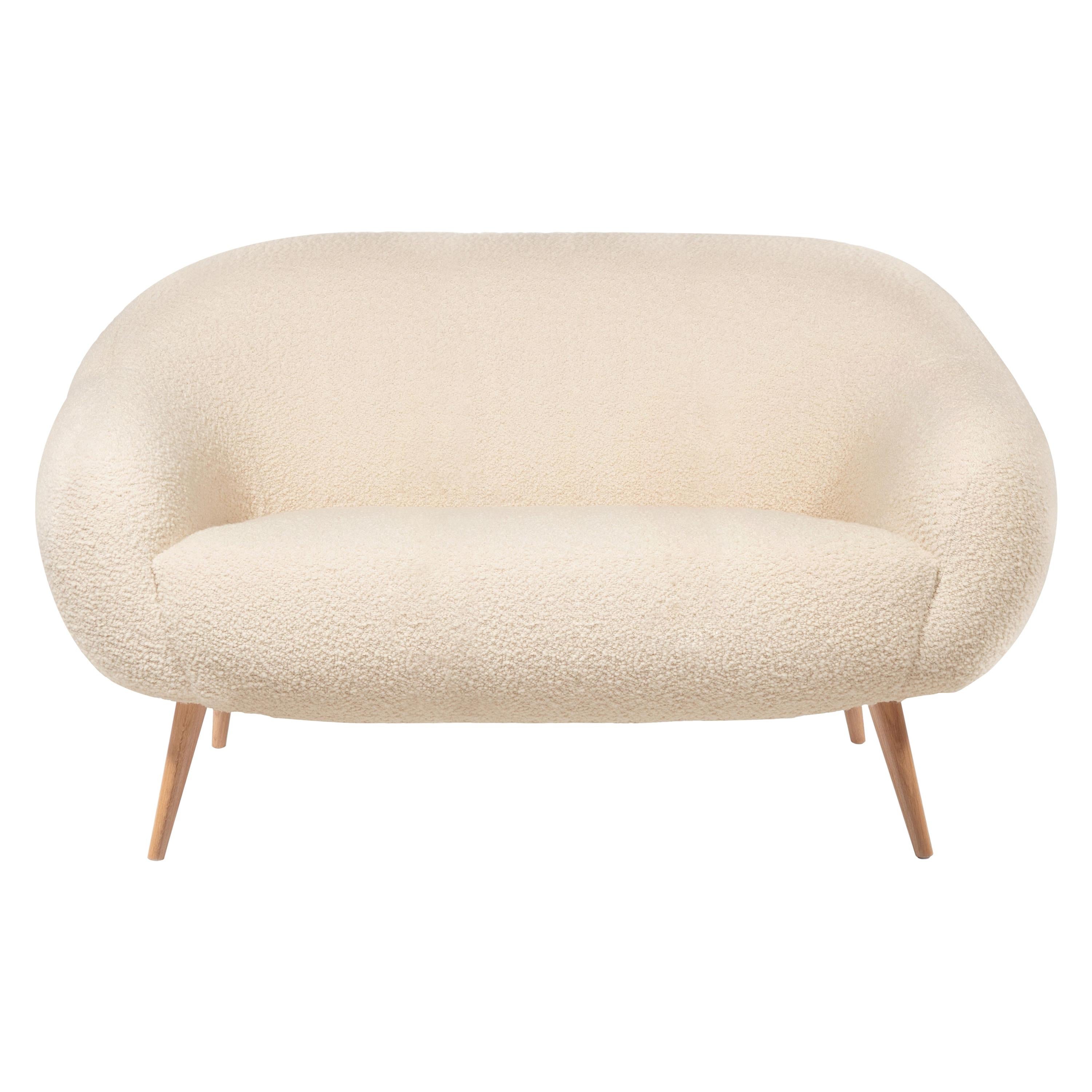 https://a.1stdibscdn.com/niemeyer-2-seat-sofa-boucle-and-oak-insidherland-by-joana-santos-barbosa-for-sale/1121189/f_218196221608261906423/21819622_master.jpg