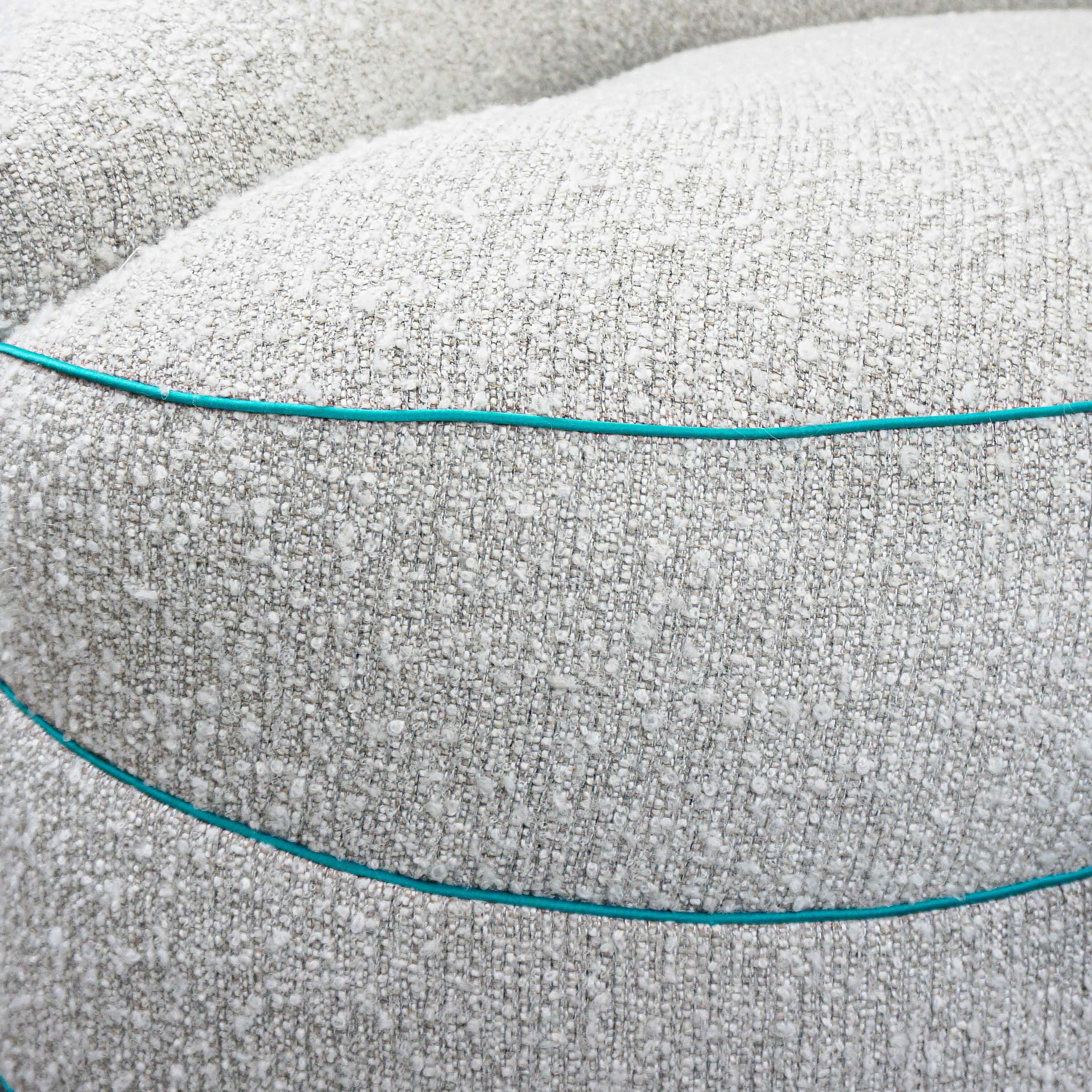 https://a.1stdibscdn.com/boucle-curved-sofa-with-turquoise-accents-for-sale-picture-17/f_21233/1622750920171/21_master.jpg