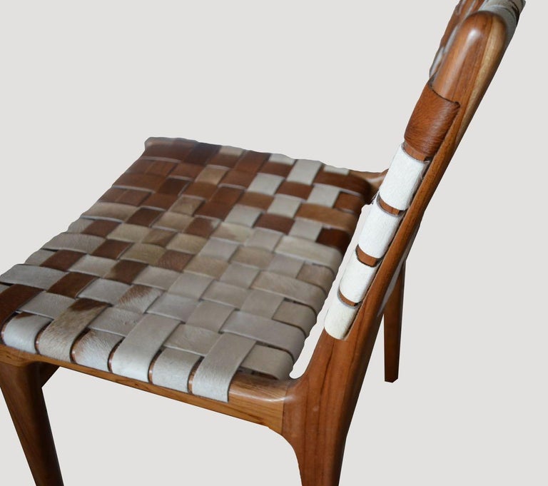 https://a.1stdibscdn.com/andrianna-shamaris-premium-double-backed-teak-wood-cowhide-chair-for-sale-picture-3/f_10806/f_365604221697038509861/21_master.jpg?width=768