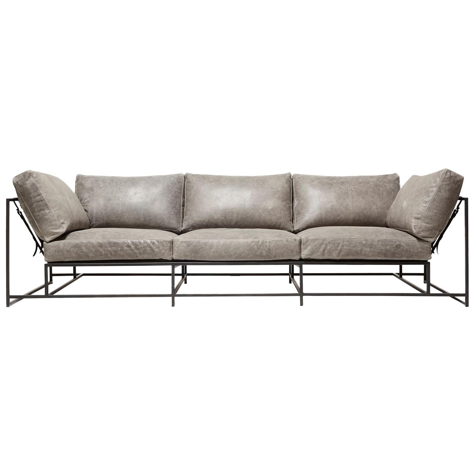 https://a.1stdibscdn.com/grey-waxed-leather-sofa-with-charcoal-powdercoat-for-sale/1121189/f_220112721609978125557/22011272_master.jpg