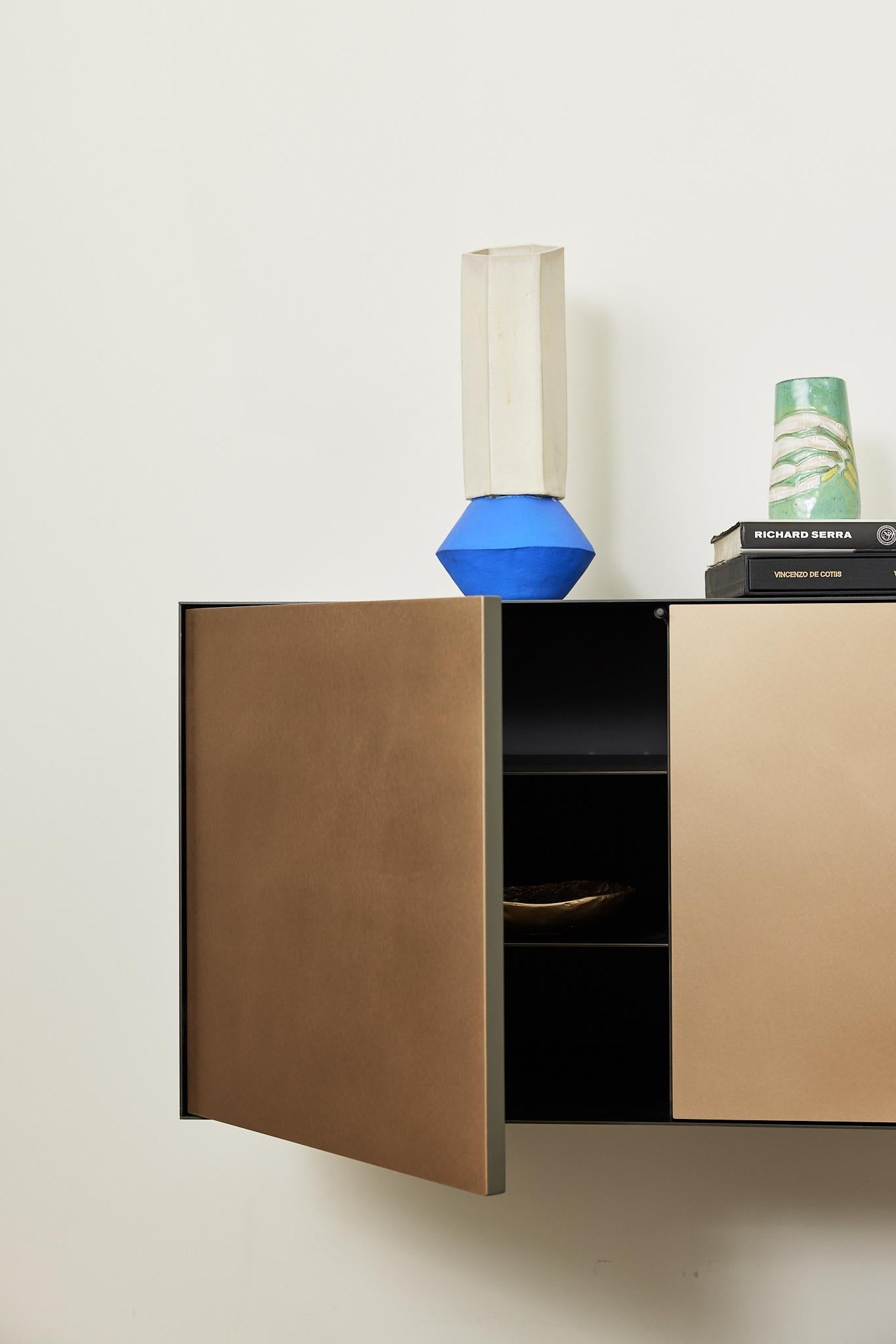 https://a.1stdibscdn.com/connect-credenza-five-door-floating-console-in-steel-and-satin-bronze-for-sale-picture-4/f_30783/f_299920621660587688774/220718_New_Format_14305_revised_master.jpg