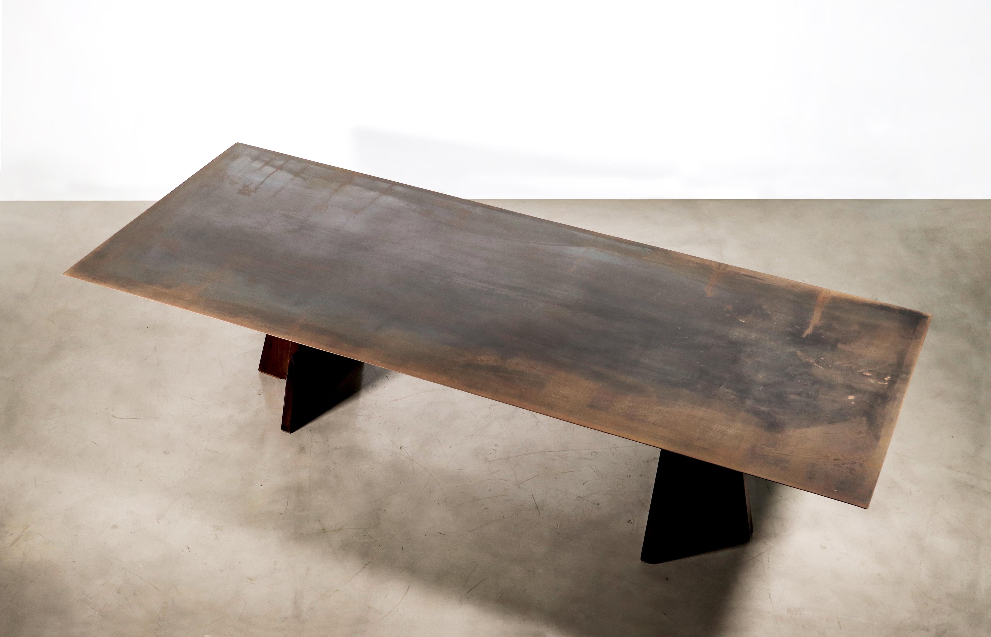 https://a.1stdibscdn.com/waxed-iron-and-exotic-wood-dining-table-from-costantini-fierro-in-stock-for-sale-picture-4/f_25173/f_302145921661948773415/220825_Fierro_Table_by_Costantini_02_master.jpg