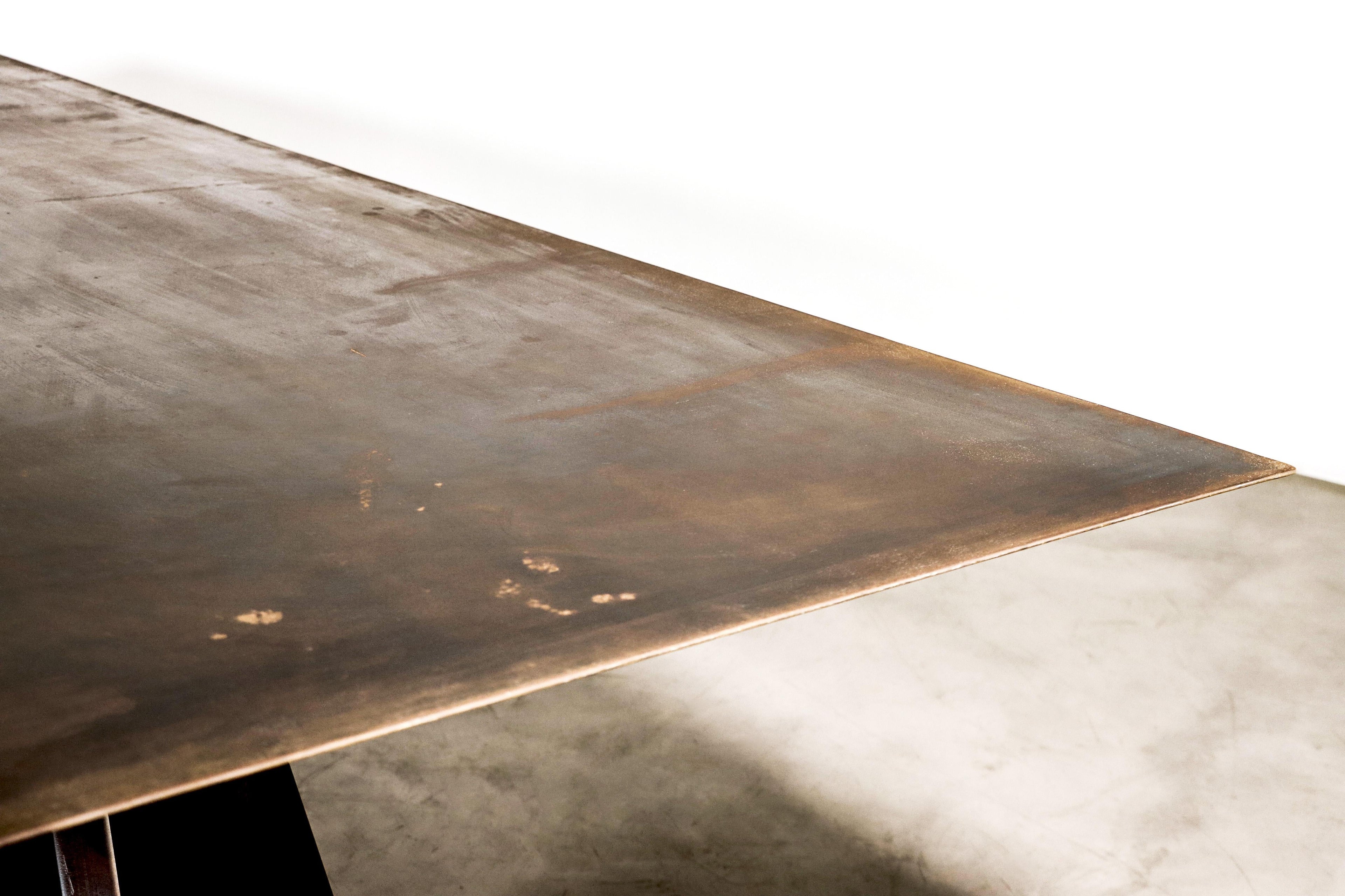 https://a.1stdibscdn.com/waxed-iron-and-exotic-wood-dining-table-from-costantini-fierro-in-stock-for-sale-picture-10/f_25173/f_302145921661948780558/220825_Fierro_Table_by_Costantini_08_master.jpg