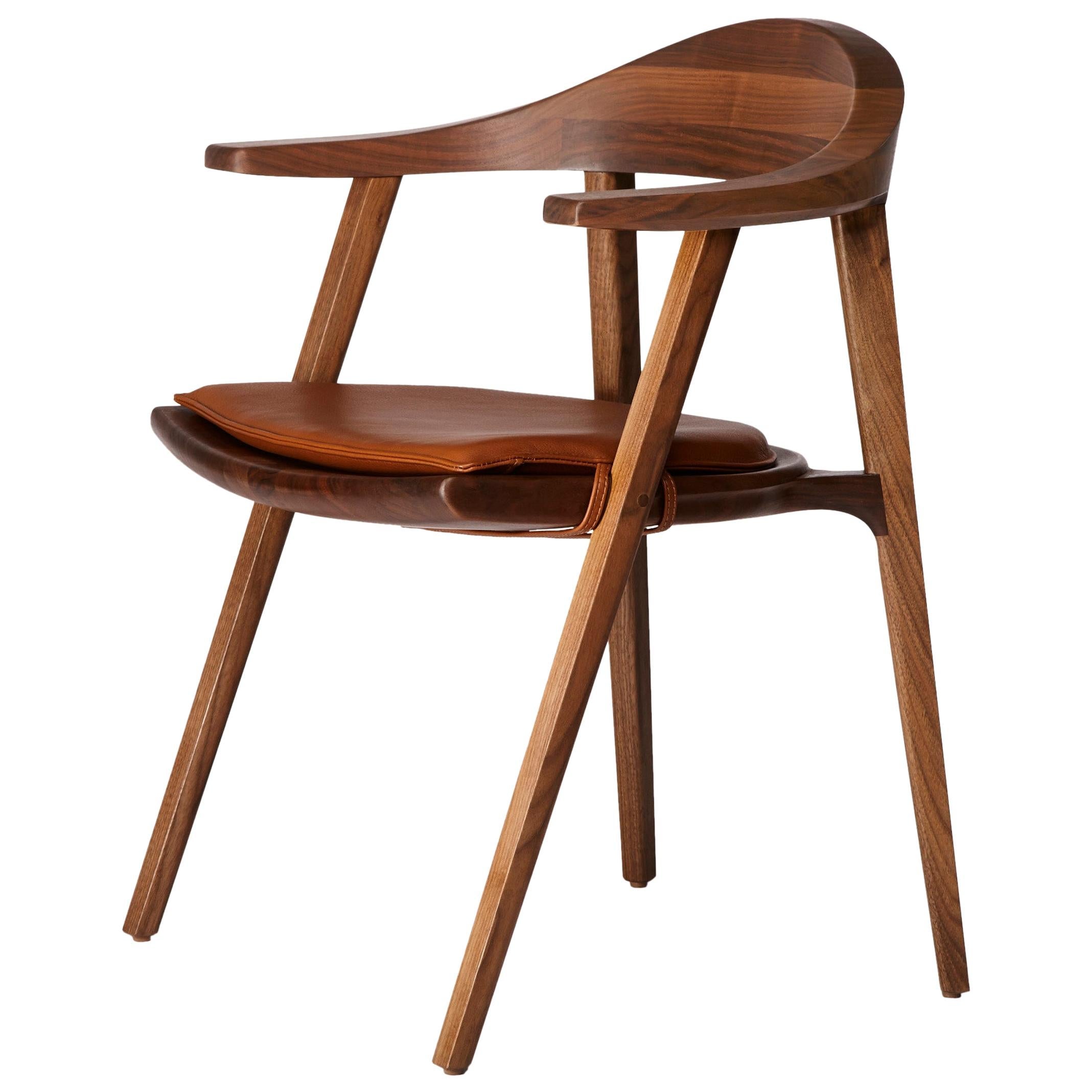 https://a.1stdibscdn.com/mantis-chair-in-solid-walnut-with-leather-cushion-designed-by-craig-bassam-for-sale/1121189/f_223787521612597003351/22378752_master.jpg