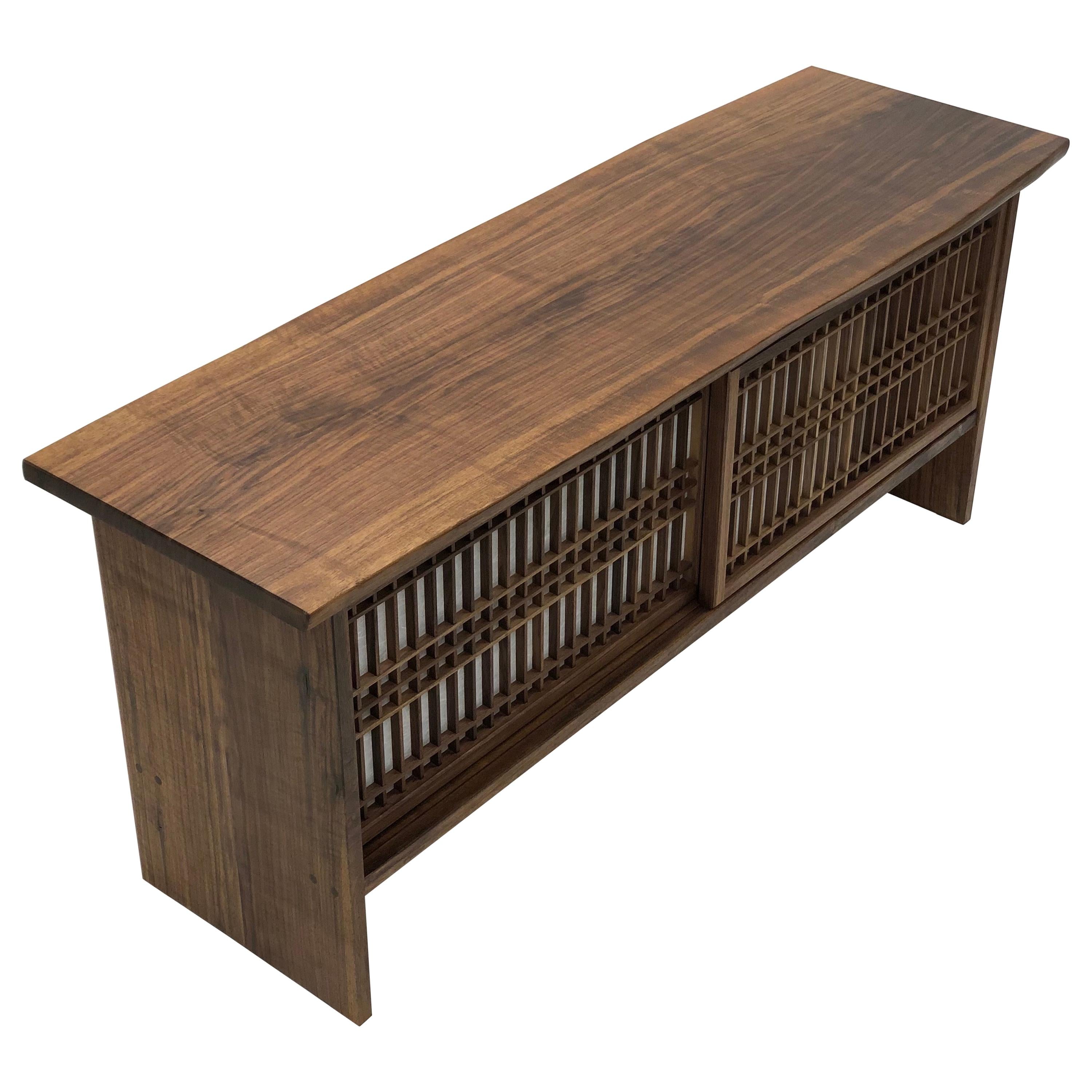 https://a.1stdibscdn.com/walnut-credenza-with-sliding-shoji-doors-for-sale/1121189/f_224459721612932369246/22445972_master.jpeg