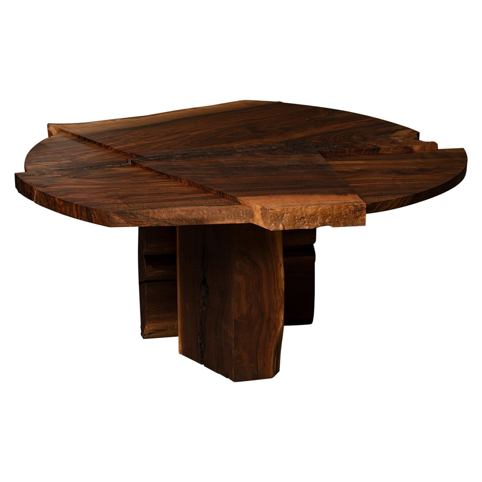 https://a.1stdibscdn.com/claro-walnut-single-slab-strike-slip-round-dining-table-for-sale/1121189/f_225859821623270196874/22585982_master.jpg