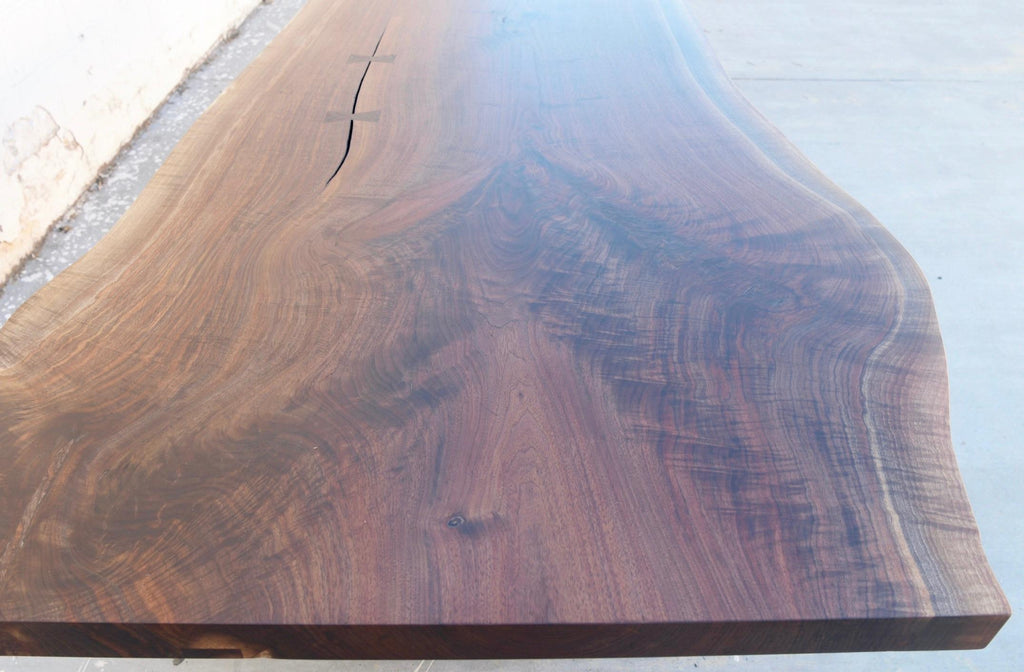 https://a.1stdibscdn.com/walnut-slab-live-edge-dining-table-custom-made-by-petersen-antiques-for-sale-picture-8/f_8065/1597847493479/2271ED83_2CF2_4F97_BB5A_512E52A7EF23_master.jpeg