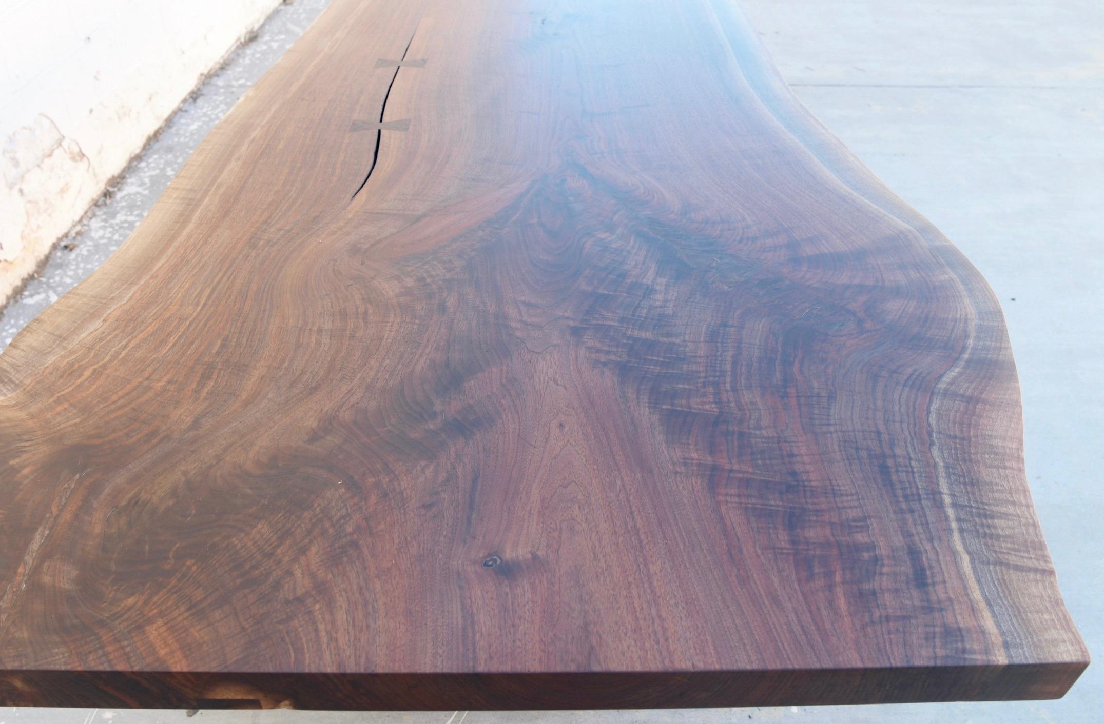 https://a.1stdibscdn.com/walnut-slab-live-edge-dining-table-custom-made-by-petersen-antiques-for-sale-picture-8/f_8065/1597847493479/2271ED83_2CF2_4F97_BB5A_512E52A7EF23_master.jpeg