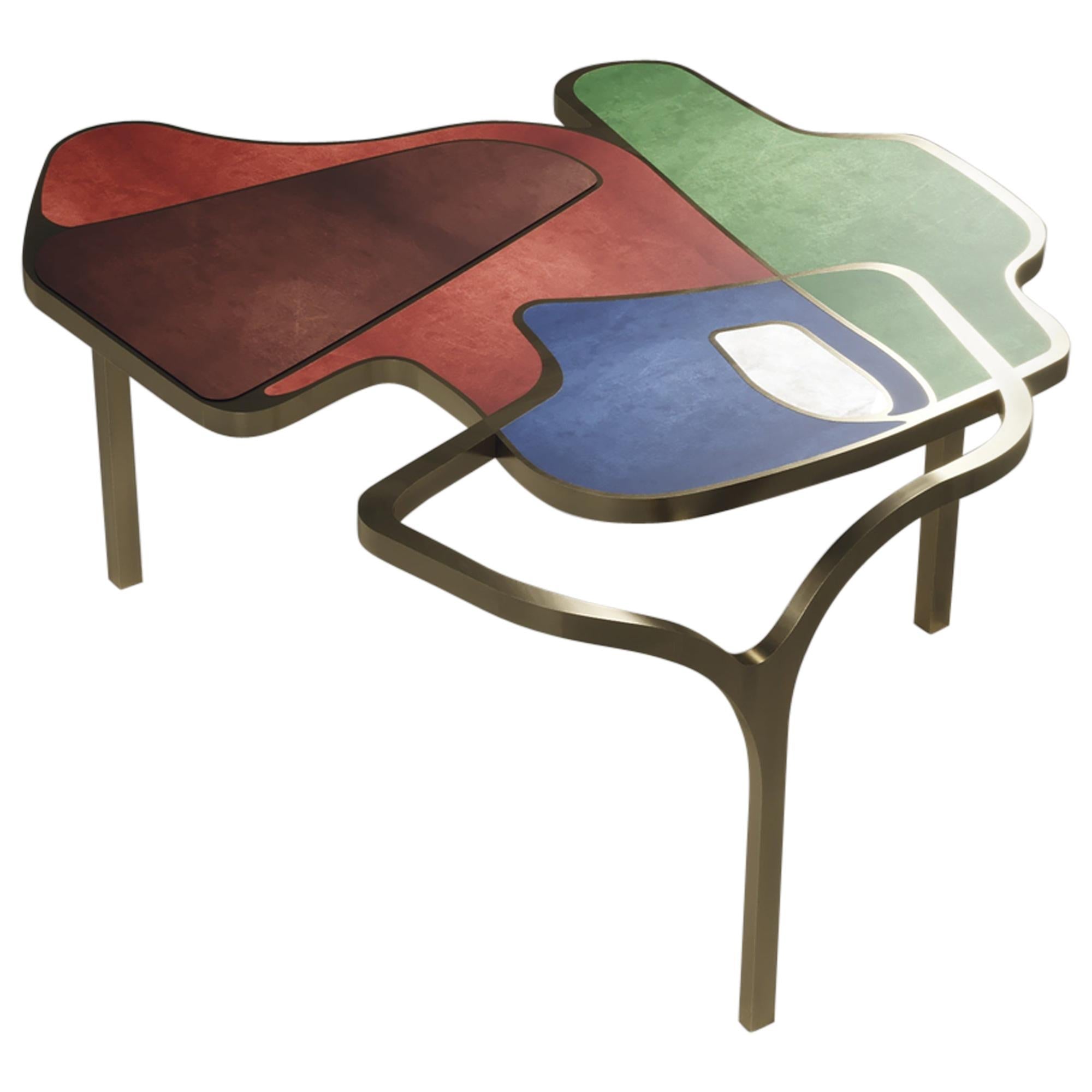 https://a.1stdibscdn.com/parchment-cocteau-coffee-table-with-brass-accents-by-r-y-augousti-for-sale/1121189/f_227975621615013066904/22797562_master.jpg